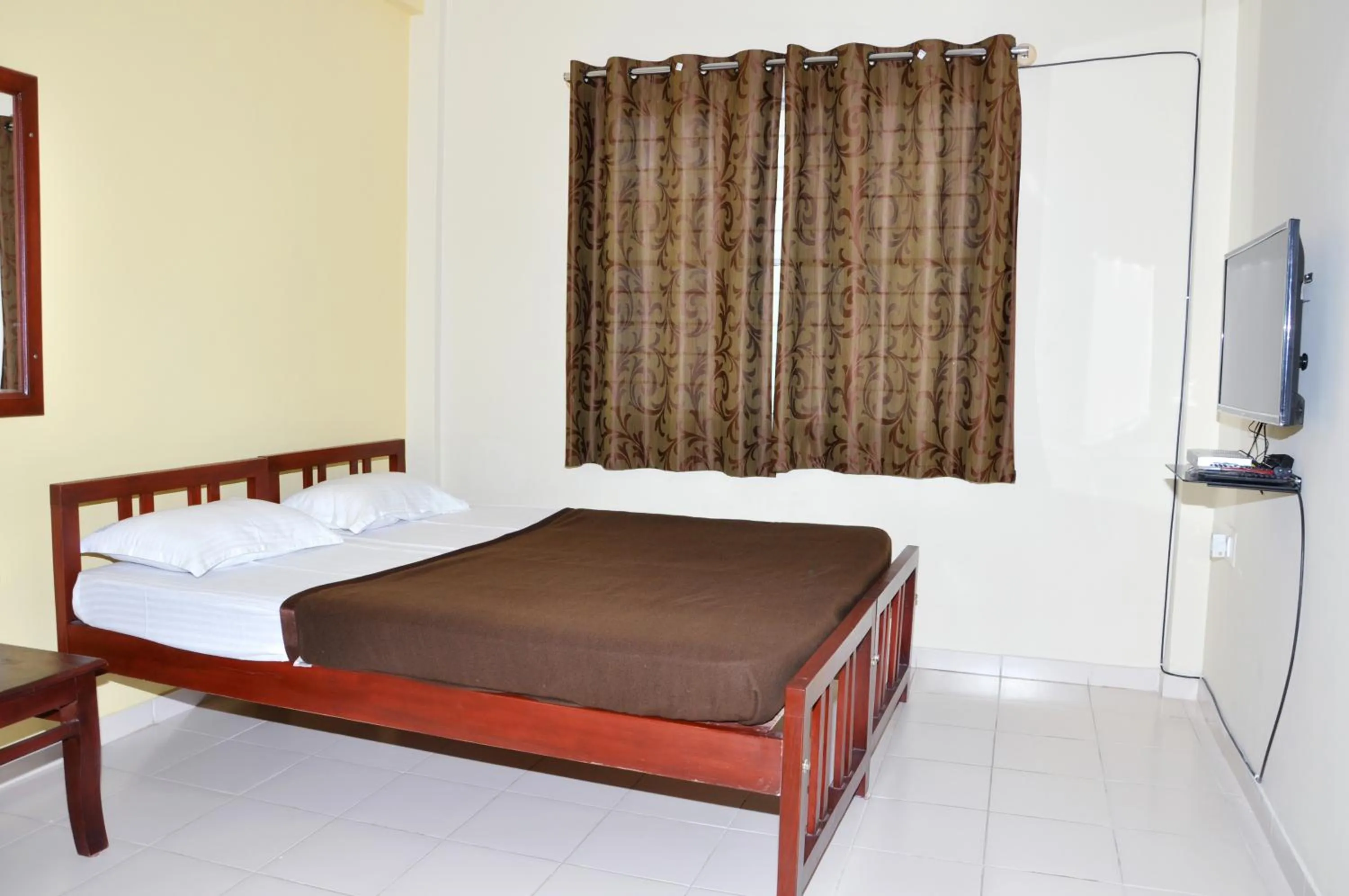 Bed in Vega Residency