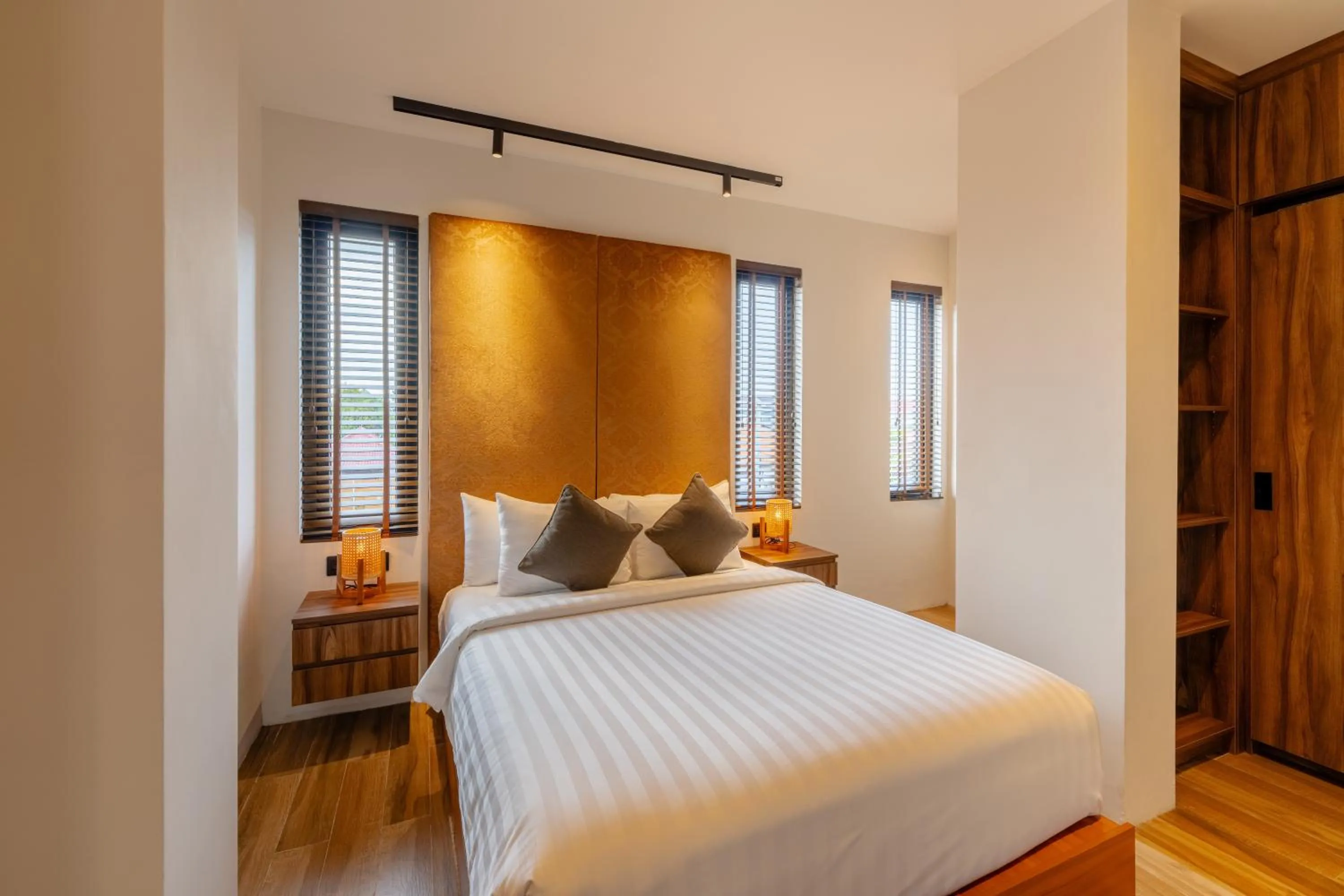 Bed in Avanya Luxury Apartment