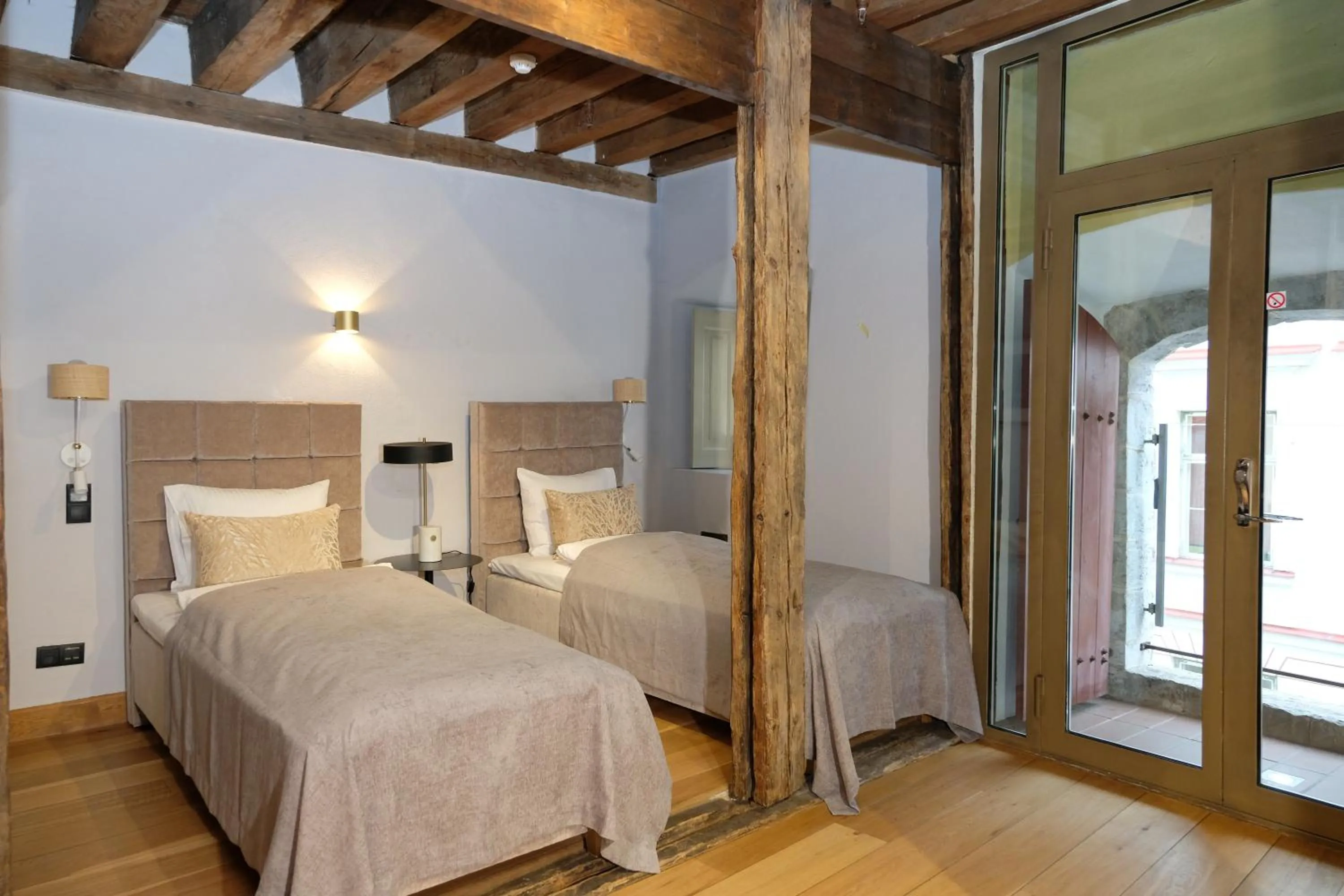 Bed in The Three Sisters Hotel