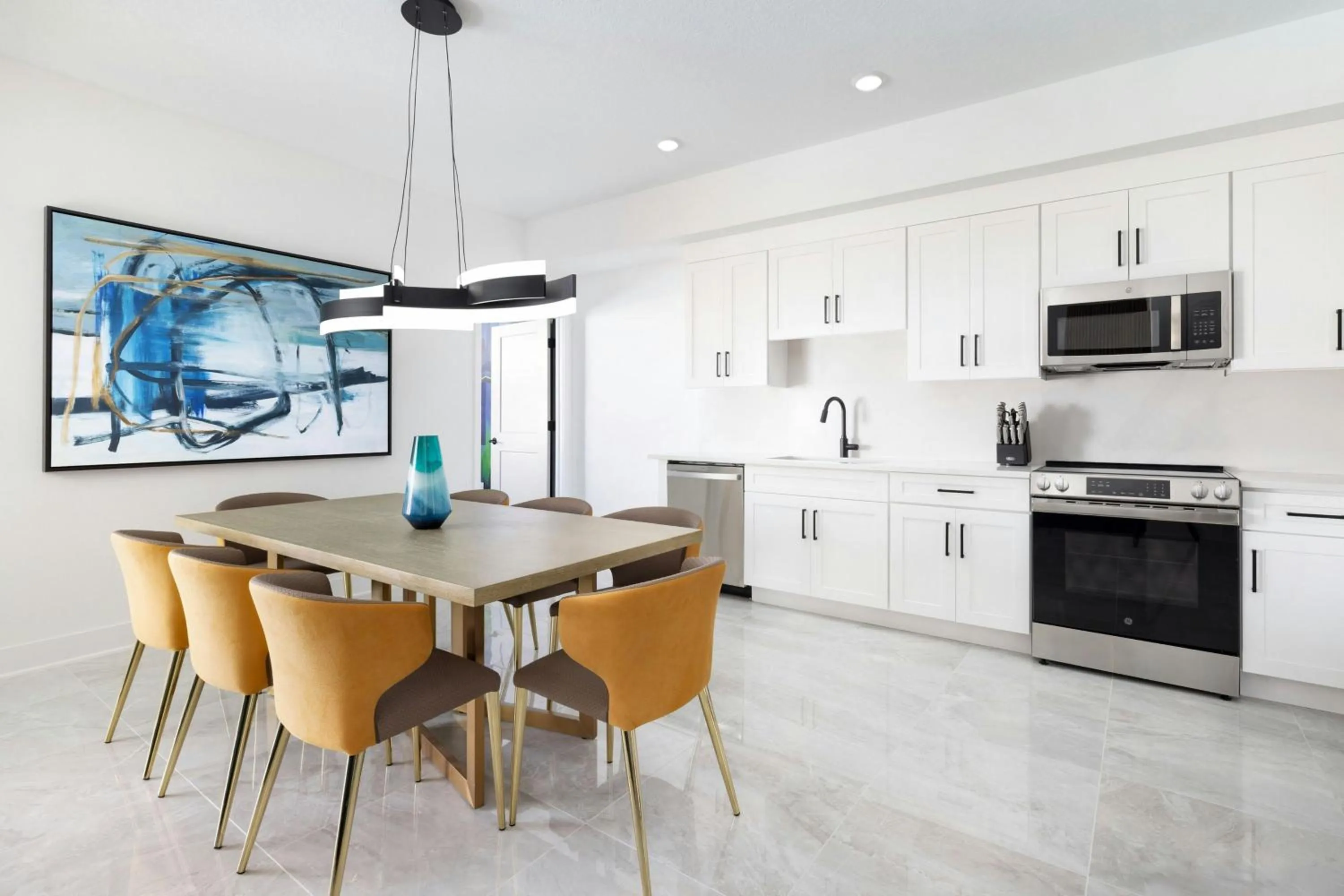 Kitchen or kitchenette in Villatel Orlando Resort, Apartments by Marriott Bonvoy