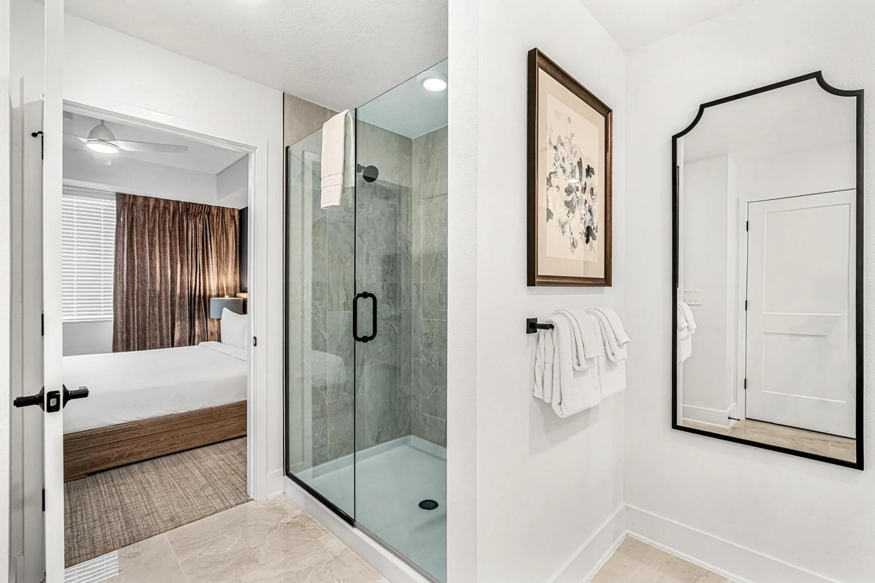Bathroom in Villatel Orlando Resort, Apartments by Marriott Bonvoy