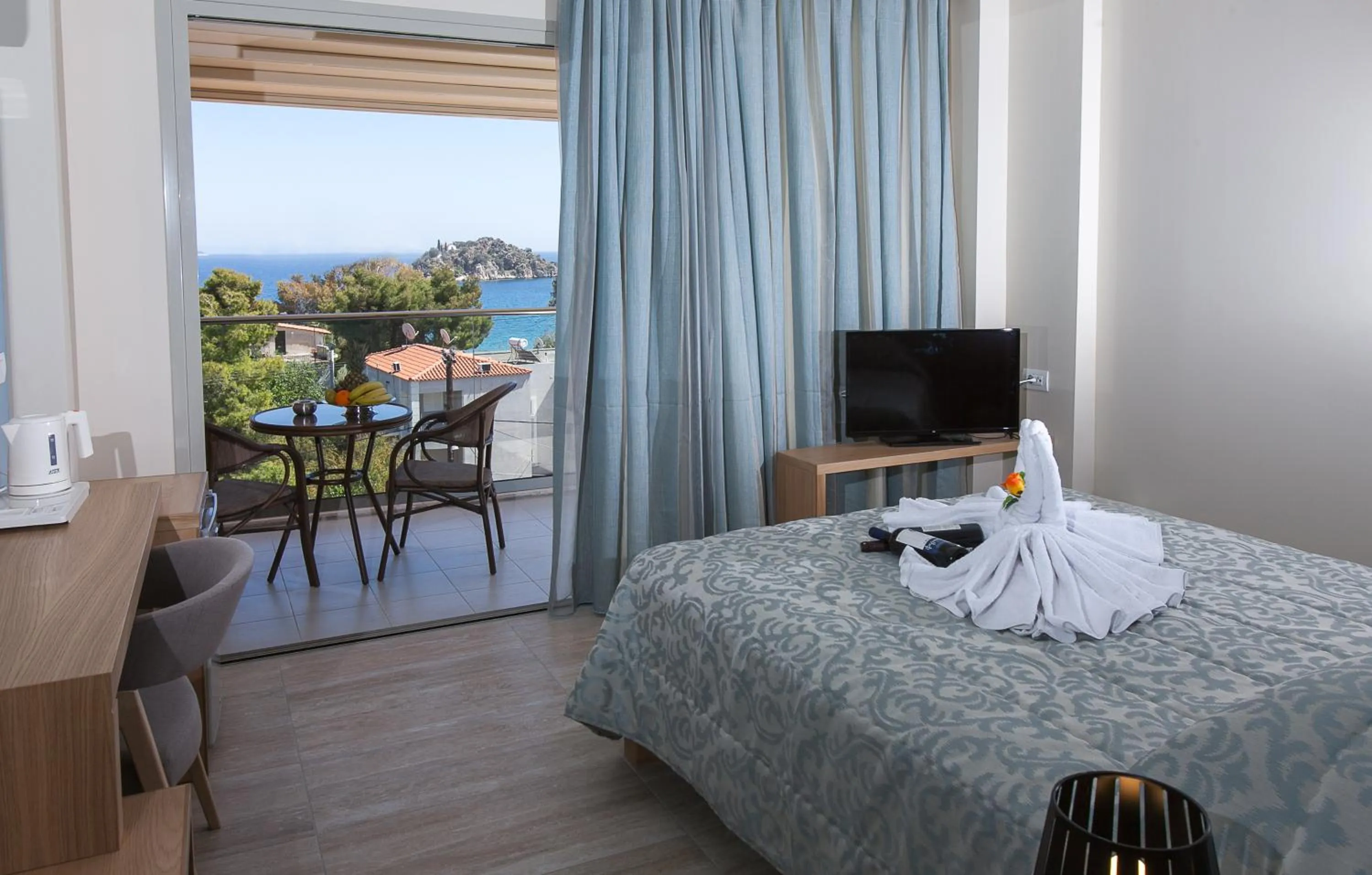 Bed in Paradise Lost Hotel-Apartments