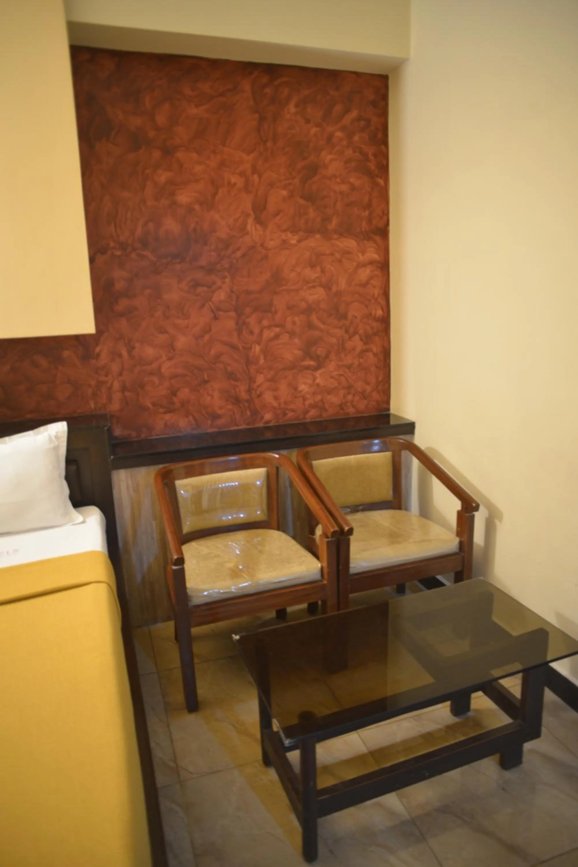 Seating area in Vijey Hotels