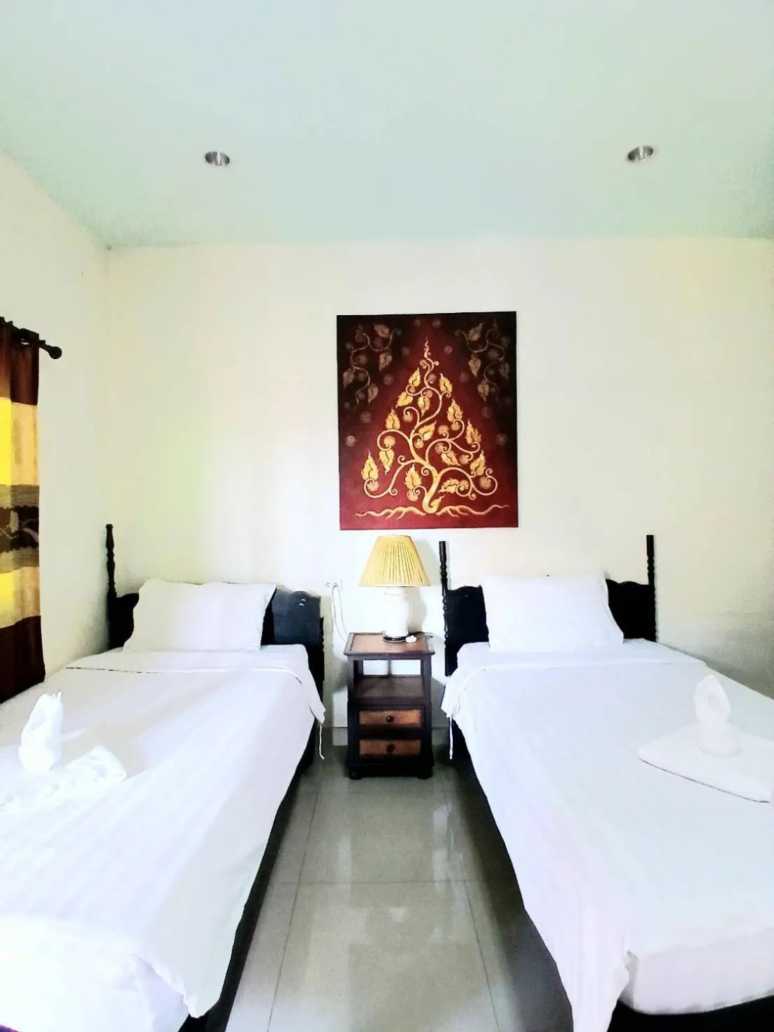 Bed in Lanna Boutique Resort Chiang Mai