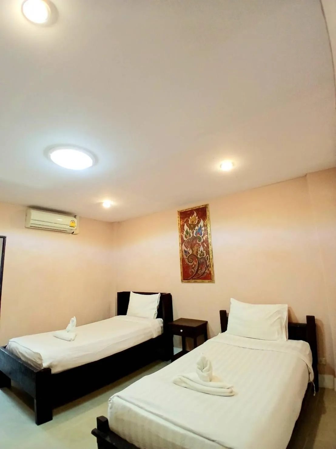 Bed in Lanna Boutique Resort Chiang Mai