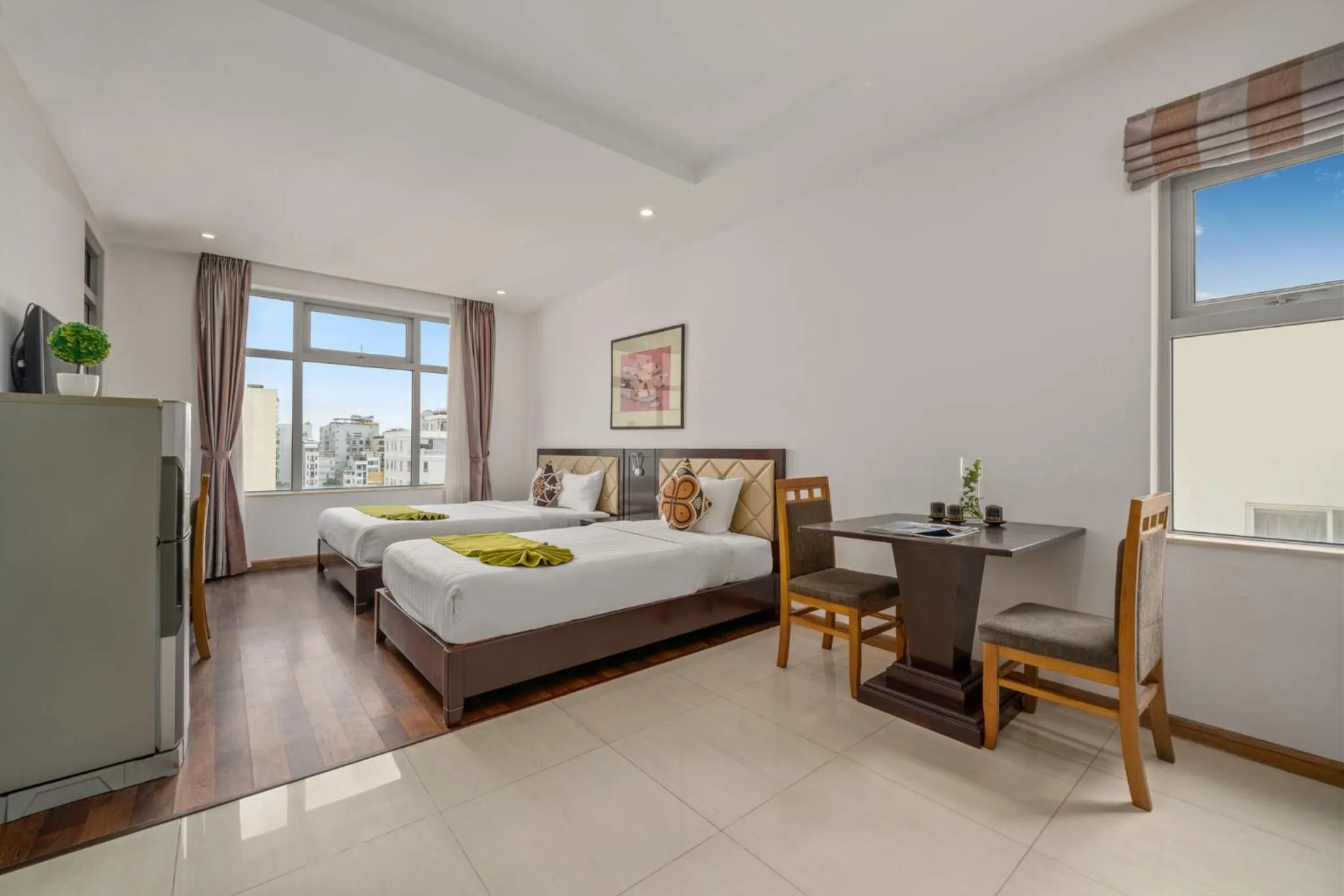 Bed in Richico Apartments And Hotel