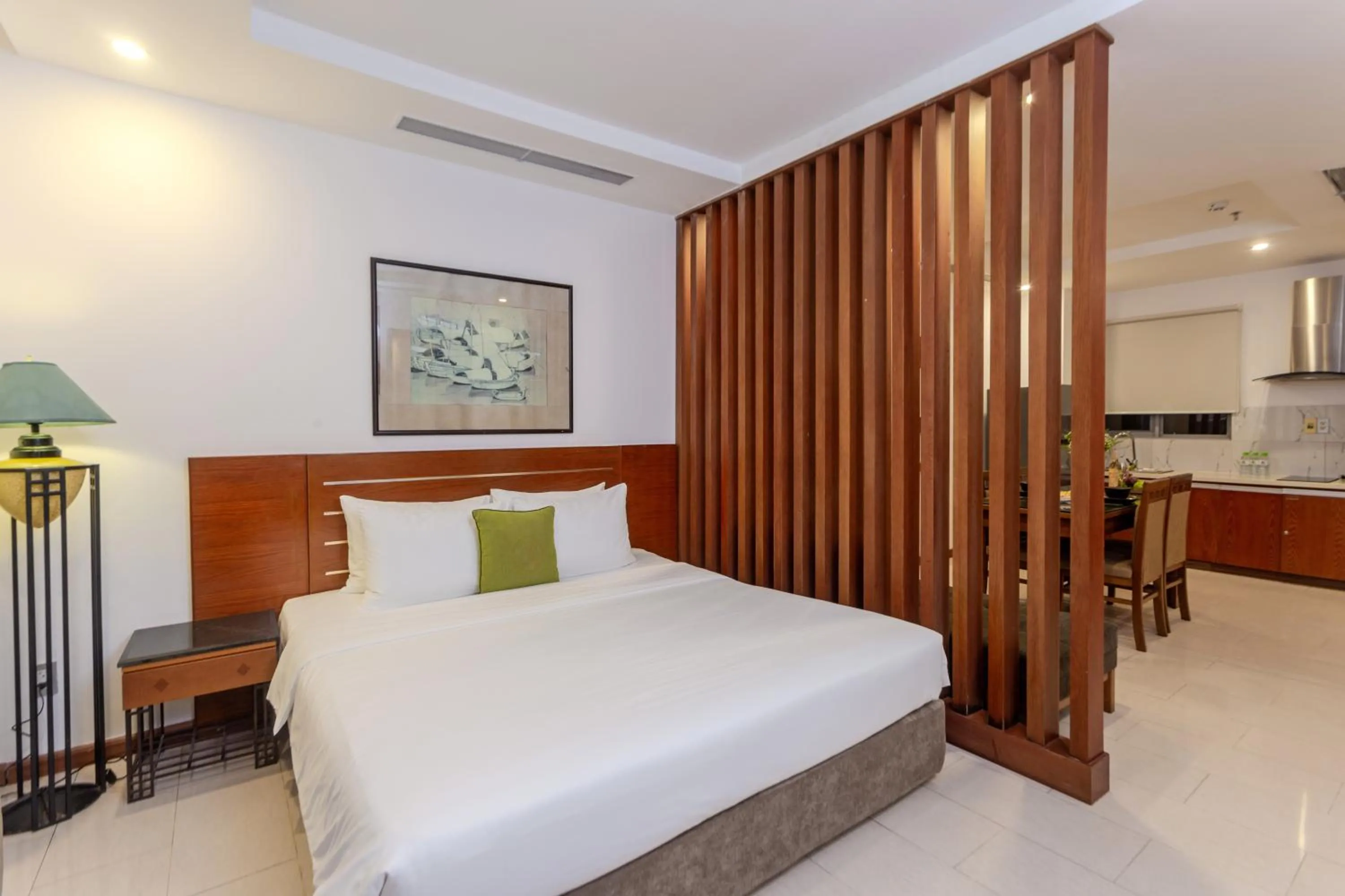 Bed in Richico Apartments And Hotel