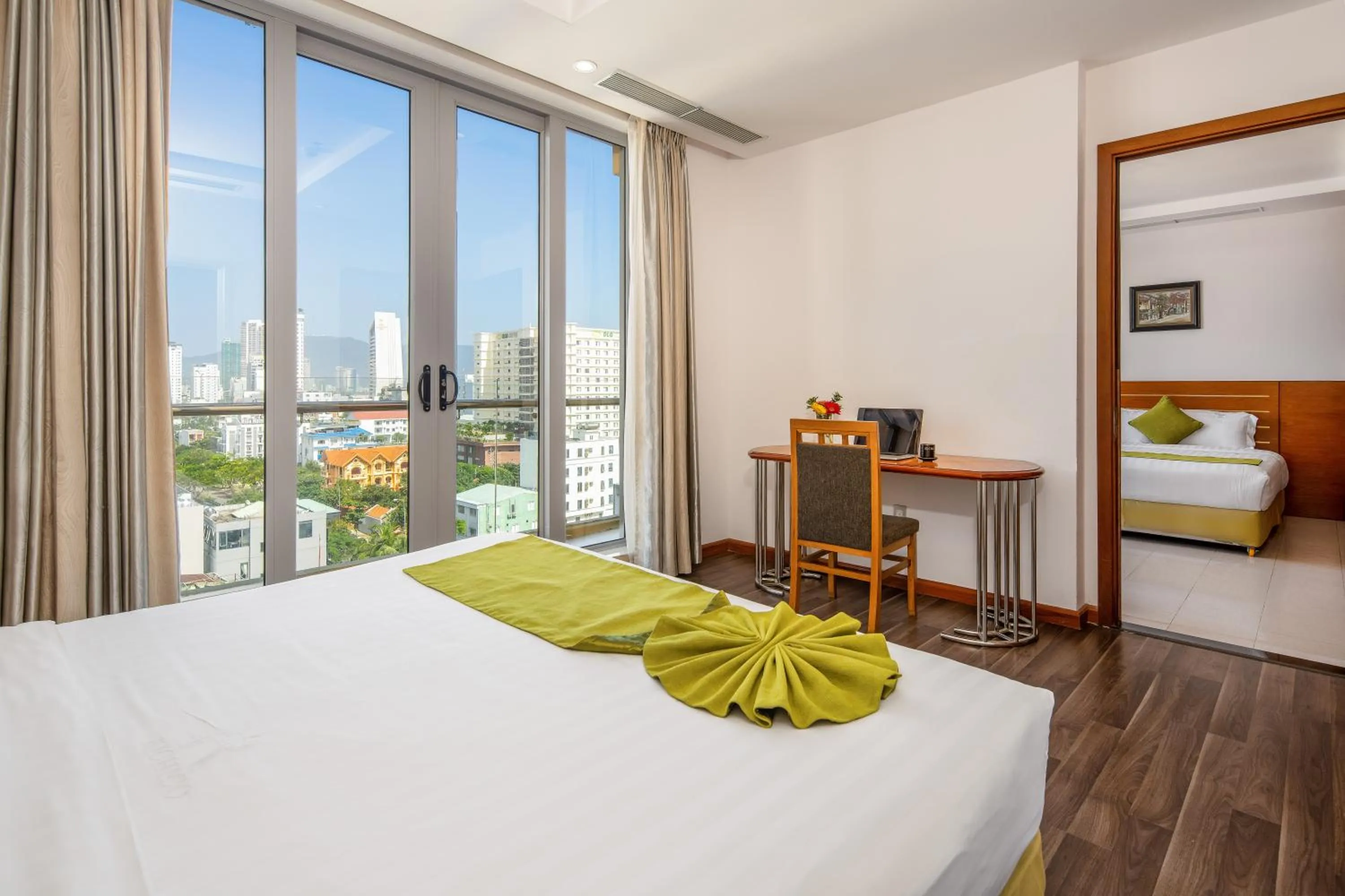 Bed in Richico Apartments And Hotel