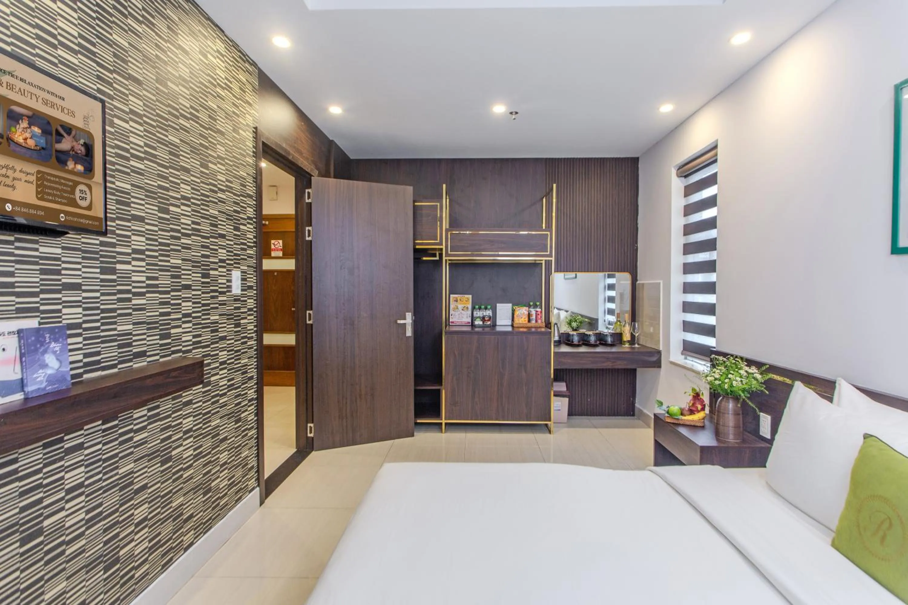 Bed in Richico Apartments And Hotel