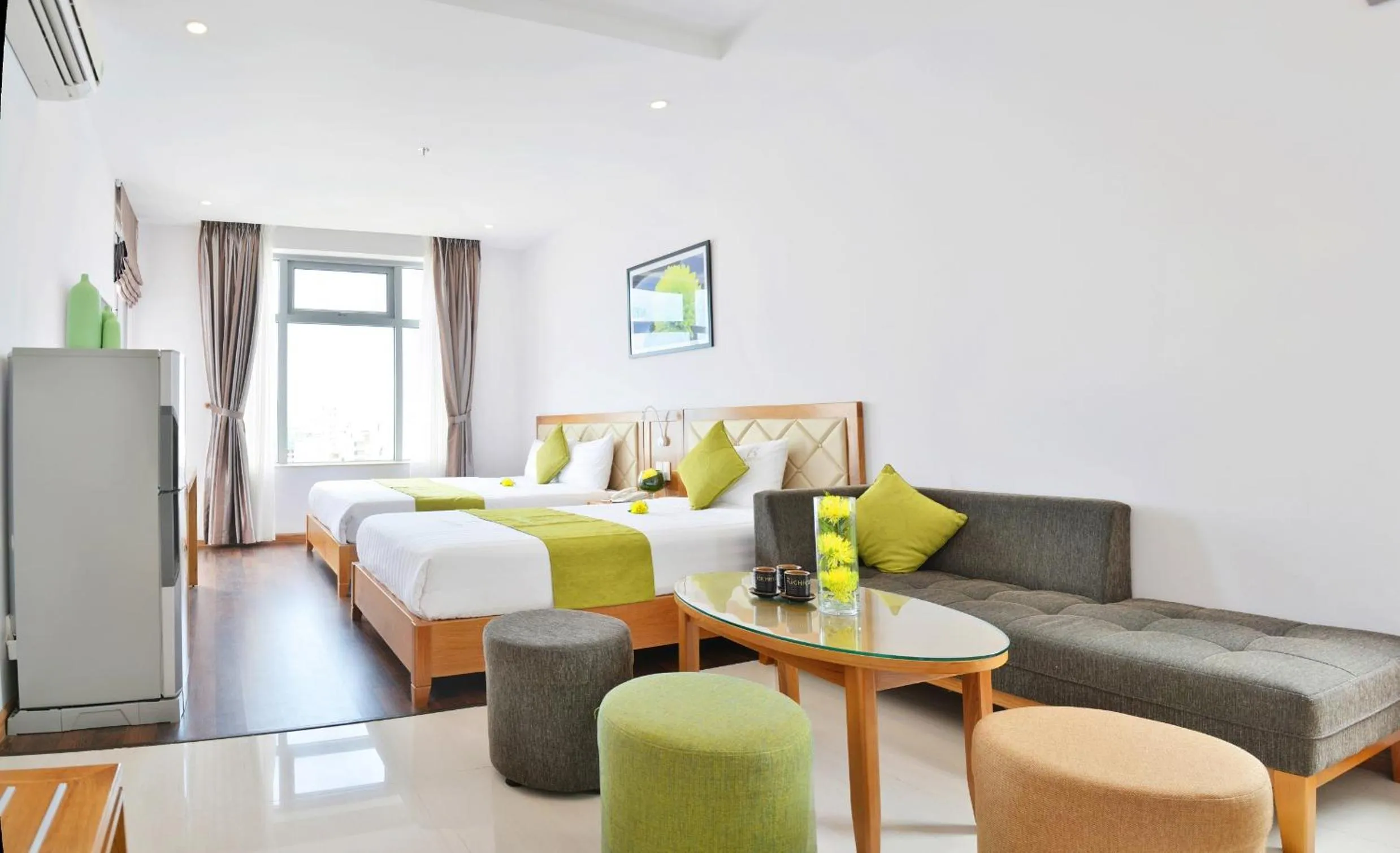 Bed in Richico Apartments And Hotel