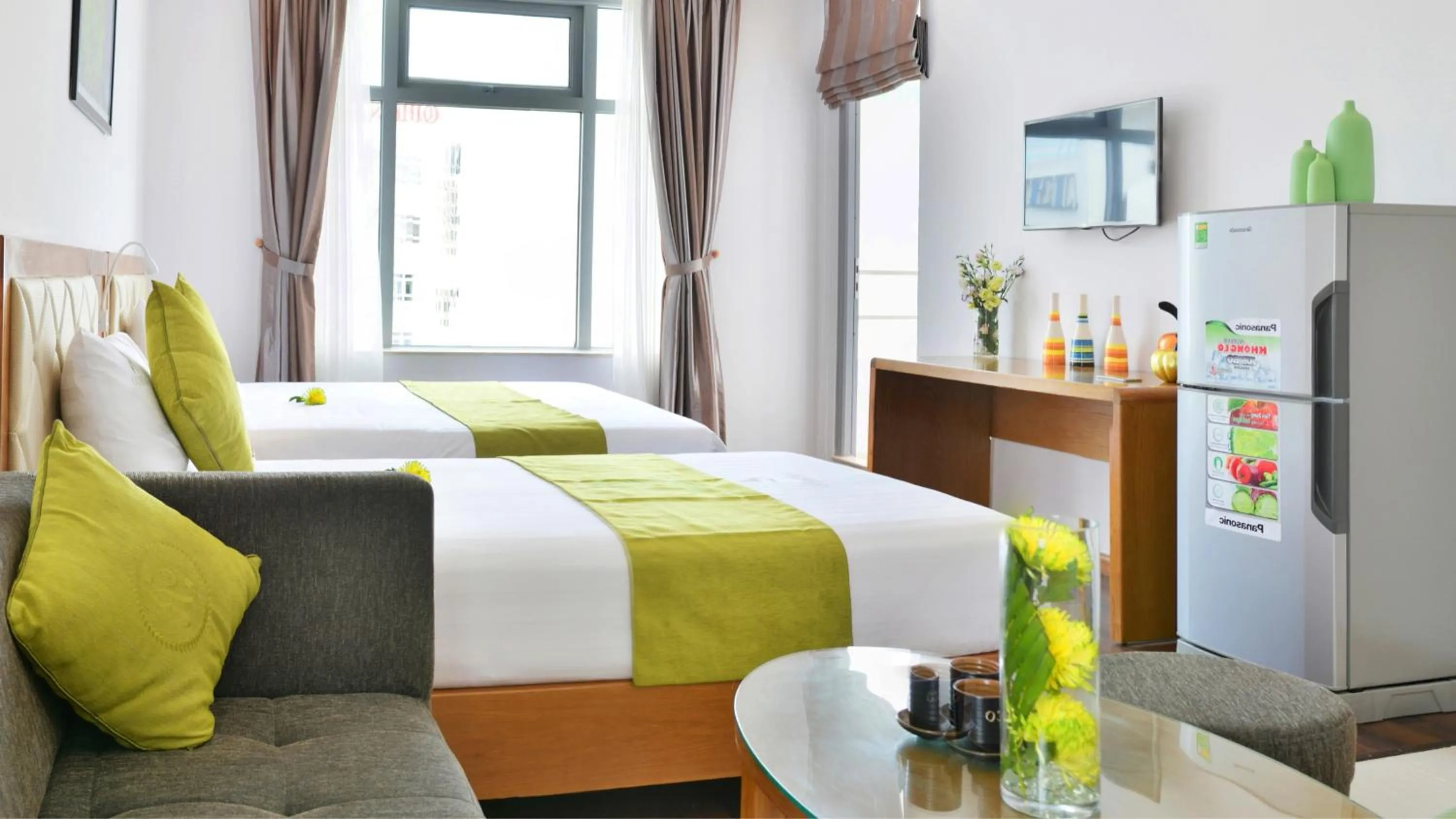 Bed in Richico Apartments And Hotel