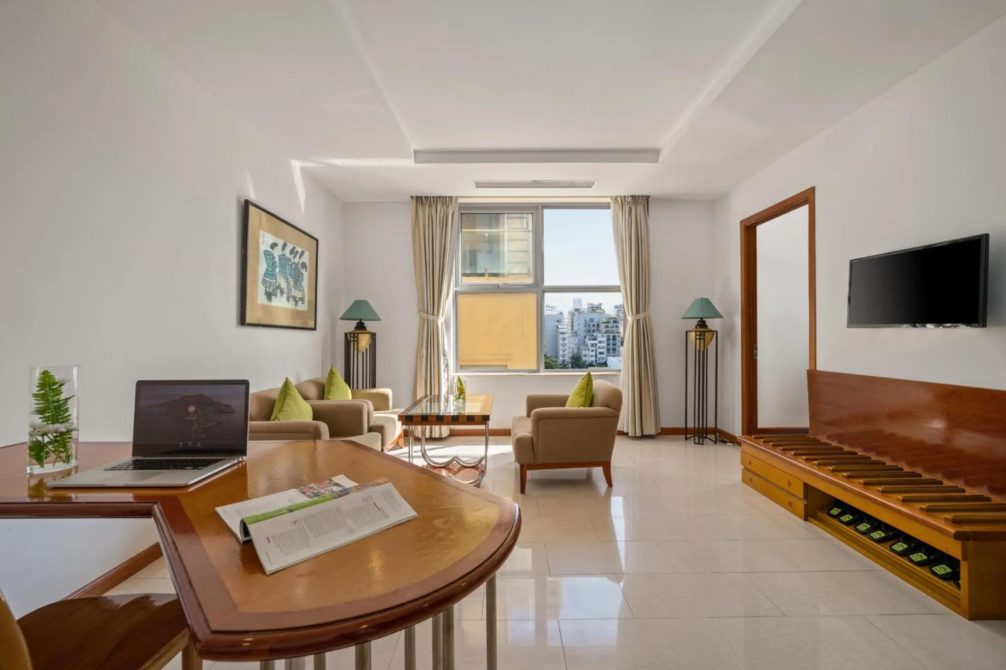 Communal lounge/ TV room in Richico Apartments And Hotel