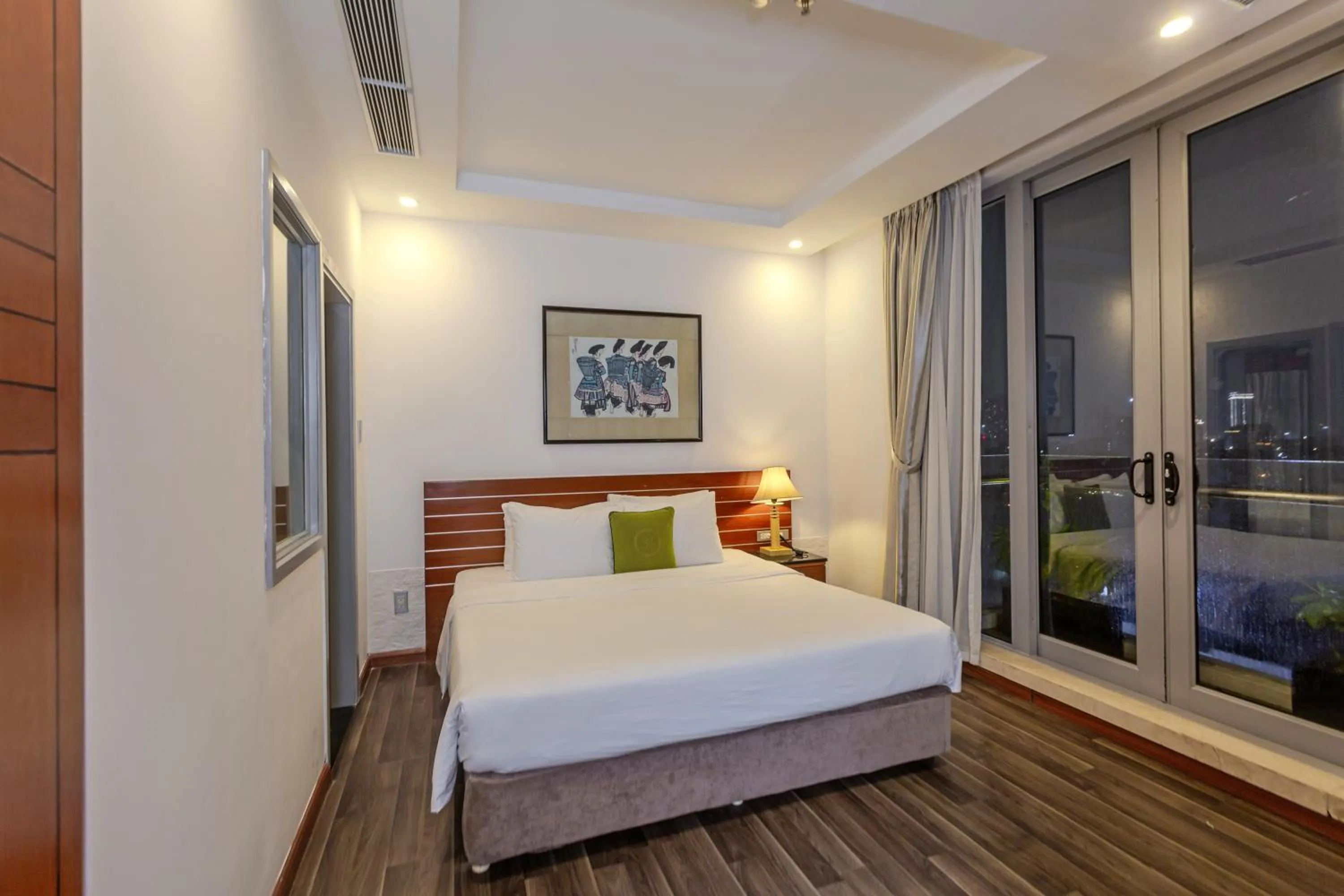 Bed in Richico Apartments And Hotel