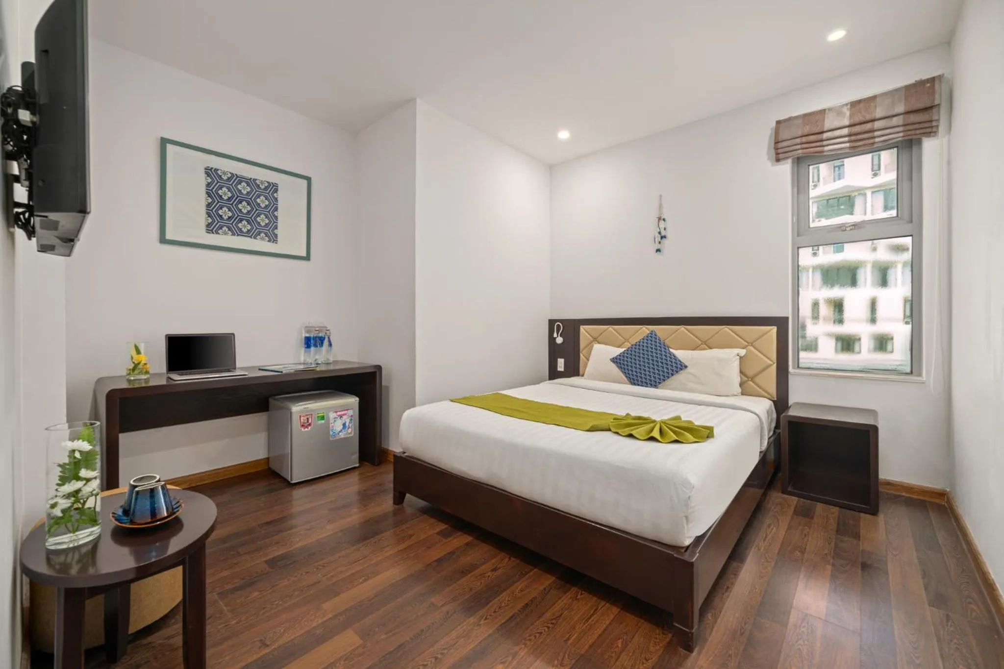 Bed in Richico Apartments And Hotel