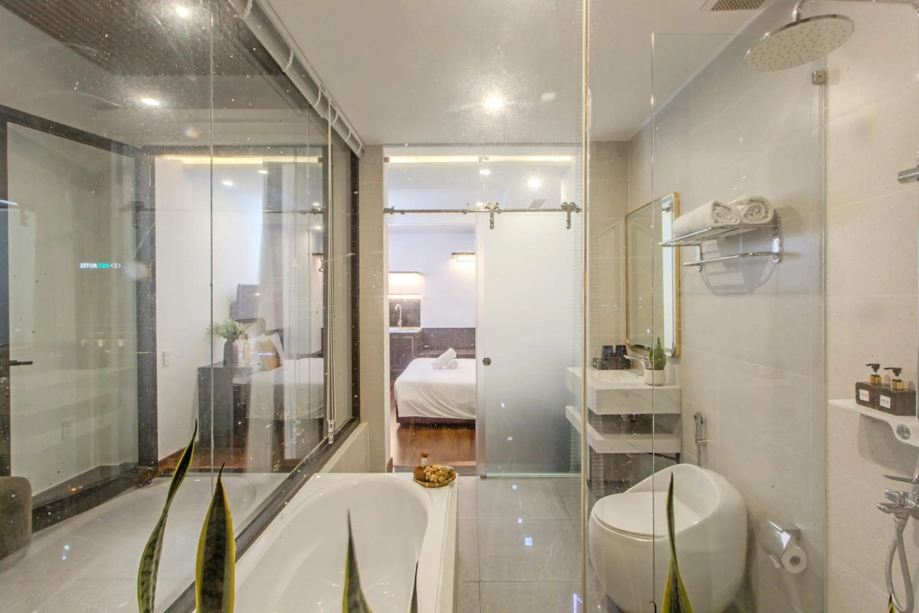 Shower in Richico Apartments And Hotel