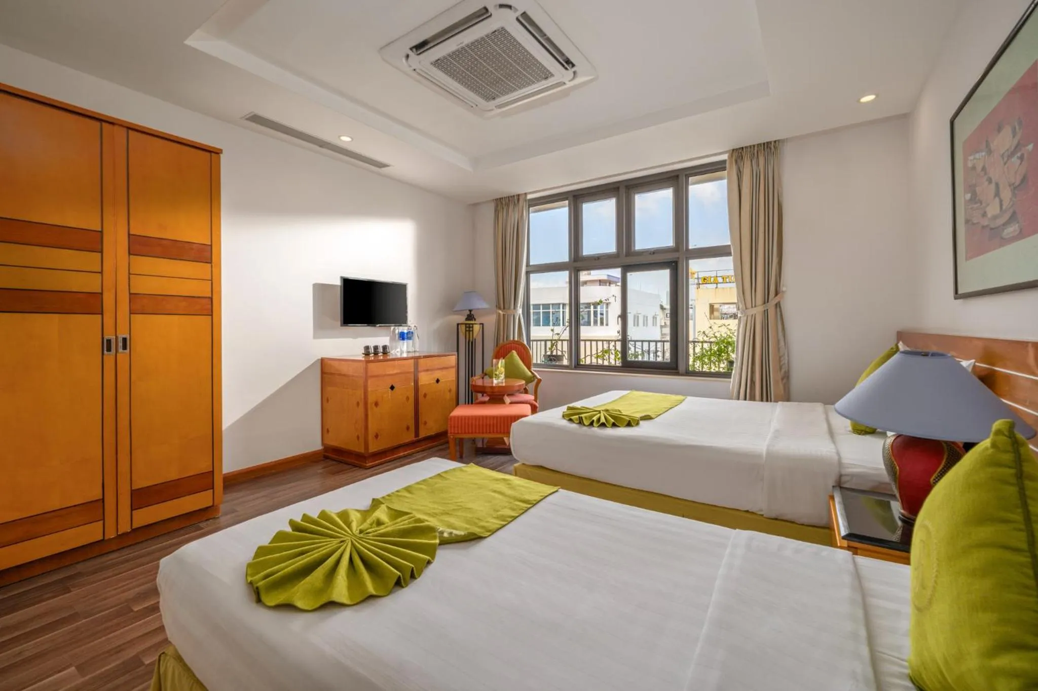 Bed in Richico Apartments And Hotel