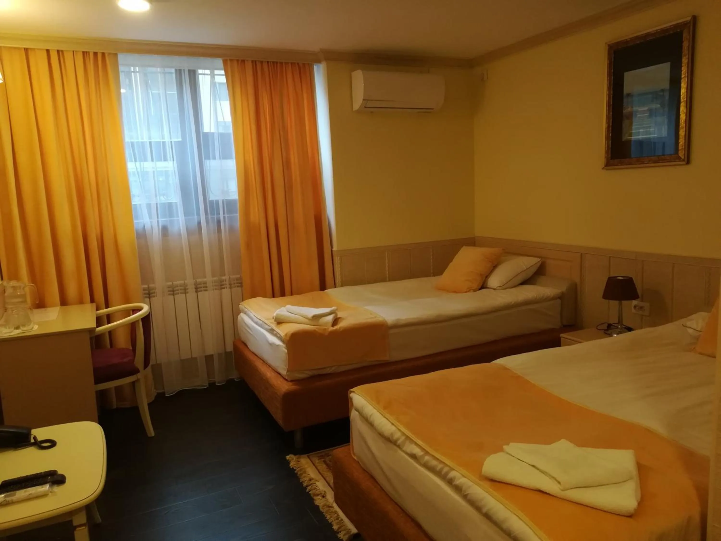 Bed in Jasmine Hotel