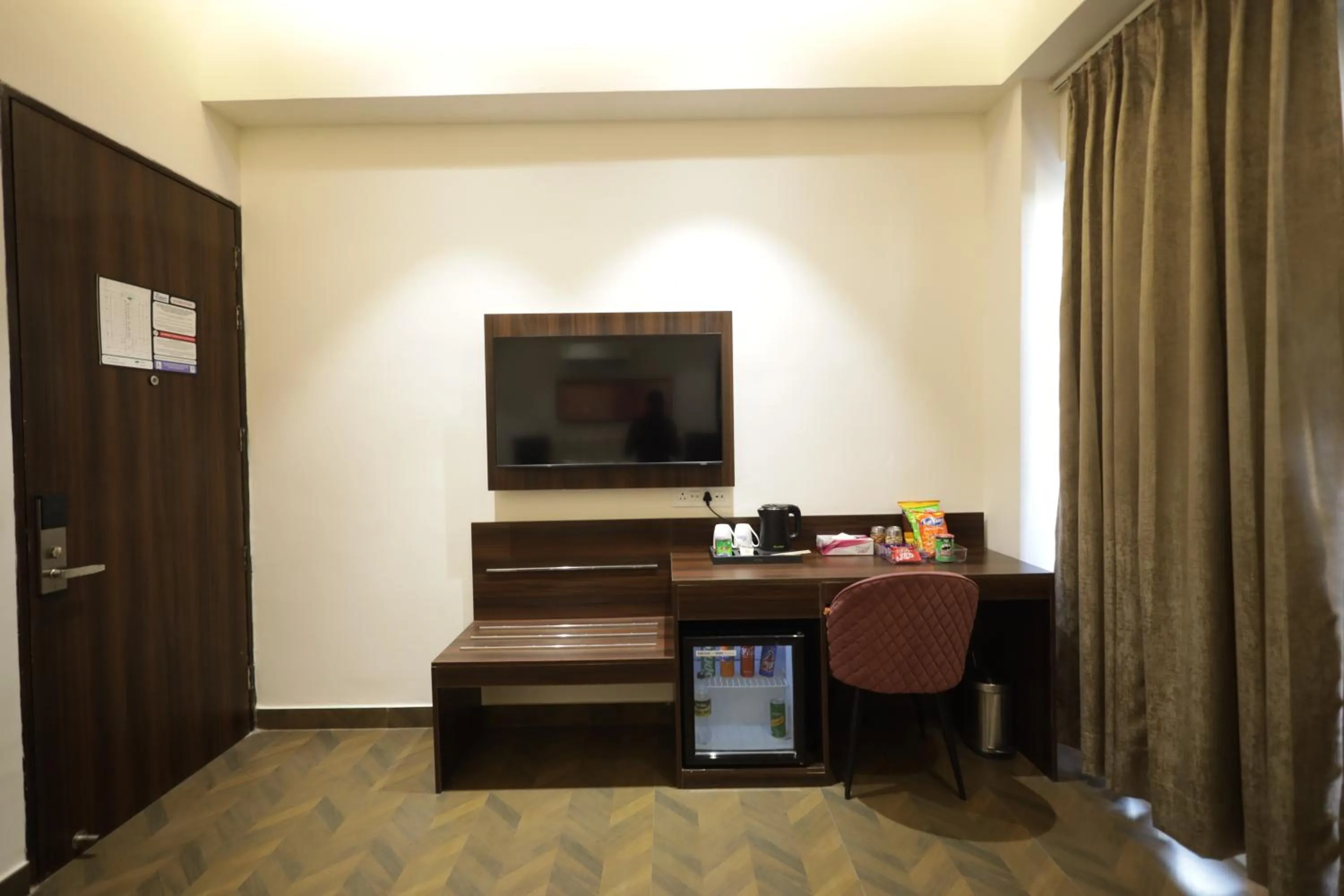 TV and multimedia in The Altruist Hotel Sec-57