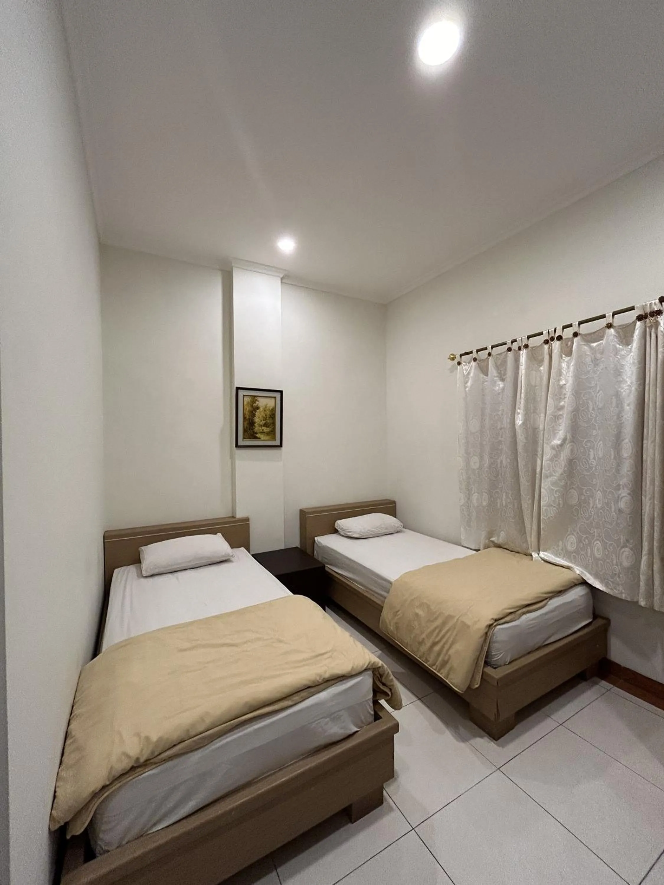 Bed in Maison Hotel Bukittinggi