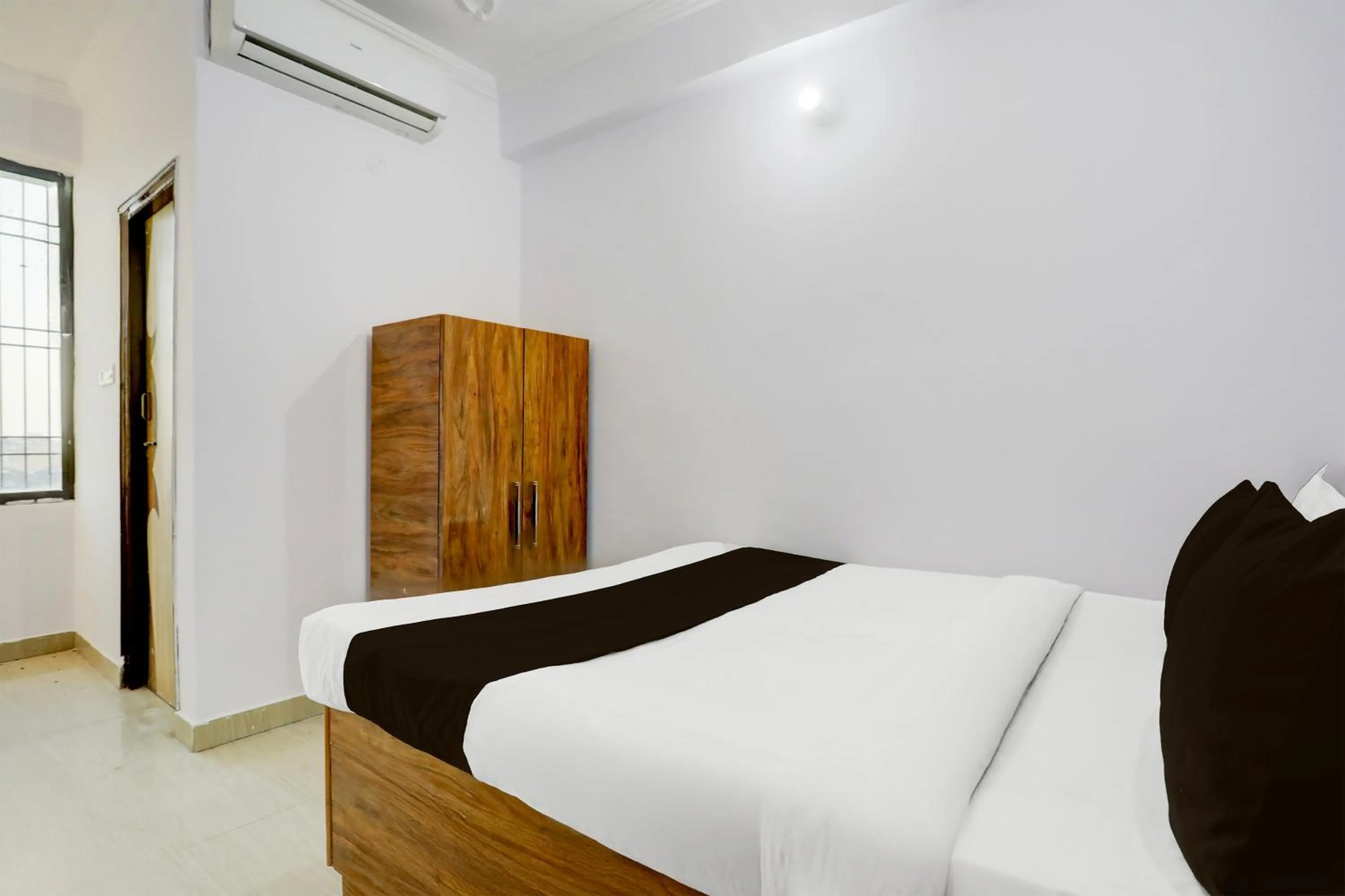 Bedroom, Bed in Super Hotel O Rajeev Nagar Formerly Happy Journey