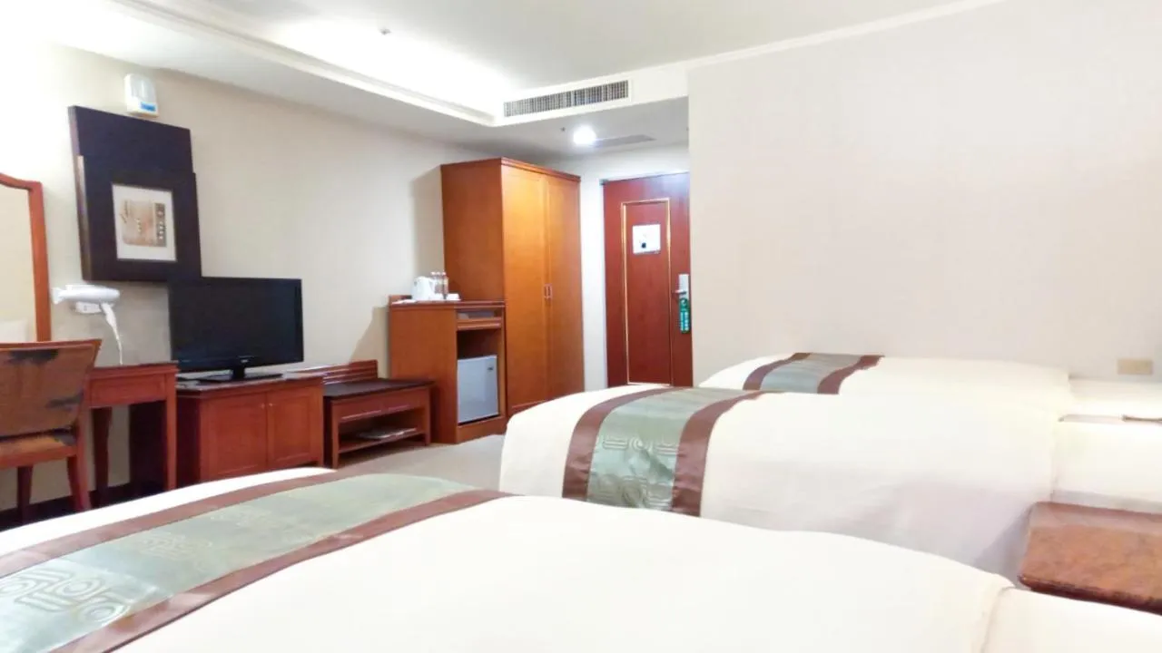Communal lounge/ TV room, Bed in Zhong Ke Hotel
