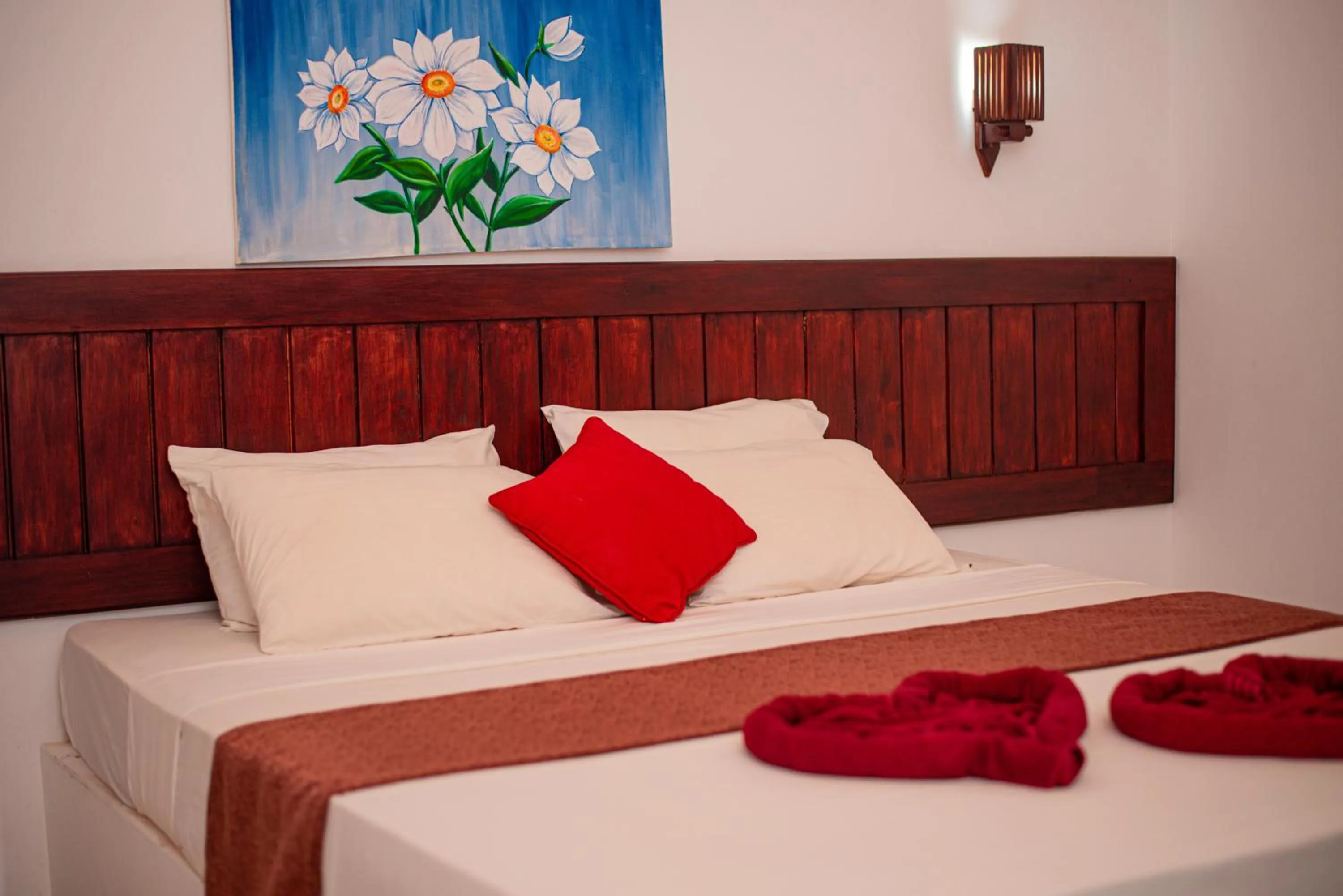 Bed in Sundowners Guesthouse