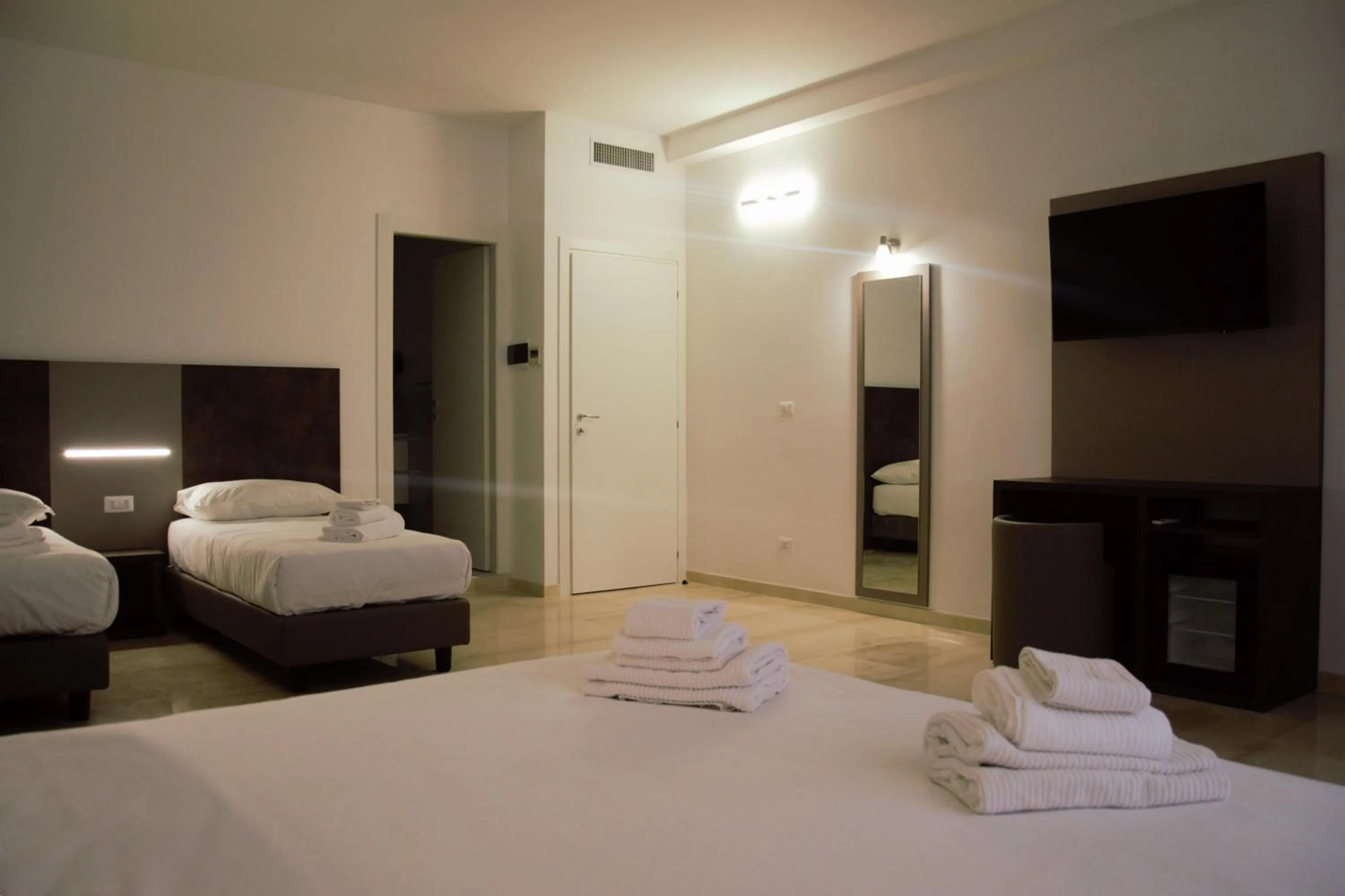 Bed in Domus Dea Roma by Trinità