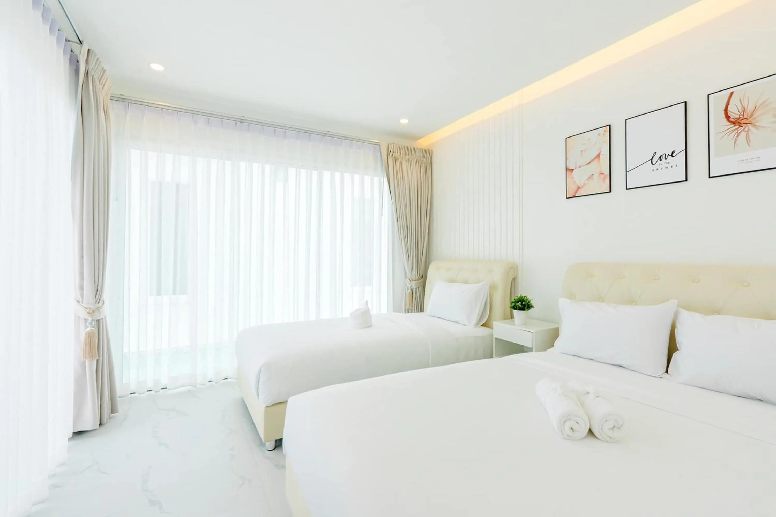 Bed in The Modern Pool Villa Hua Hin