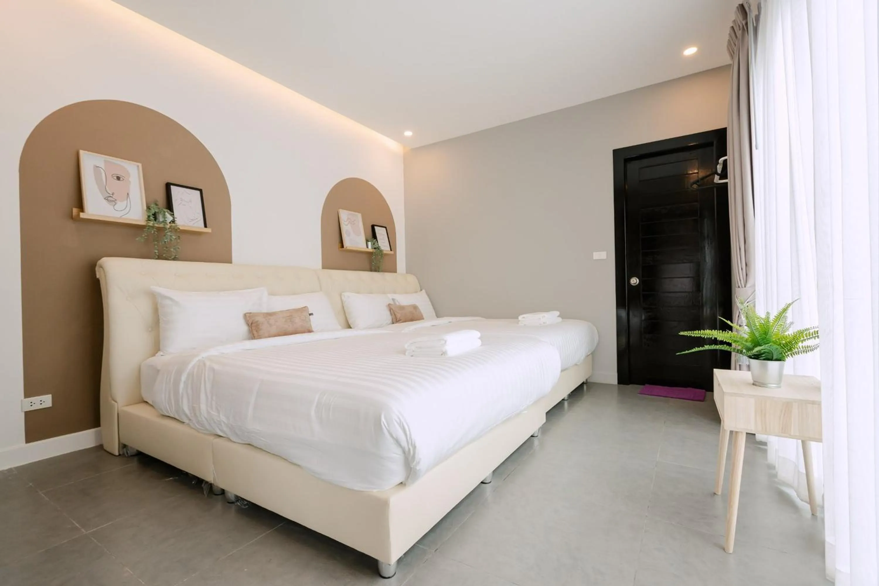 Bed in The Modern Pool Villa Hua Hin