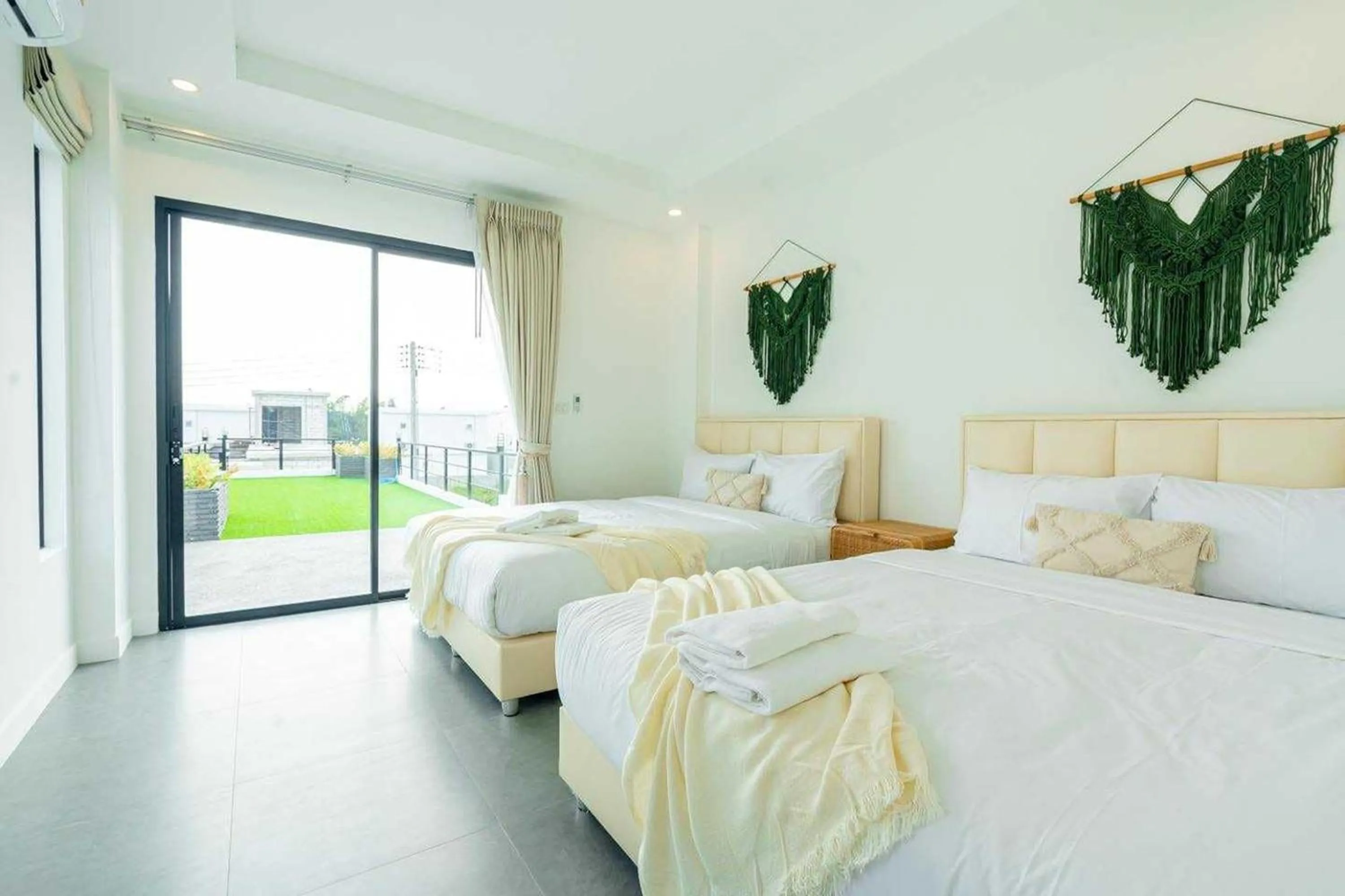 Bed in The Modern Pool Villa Hua Hin