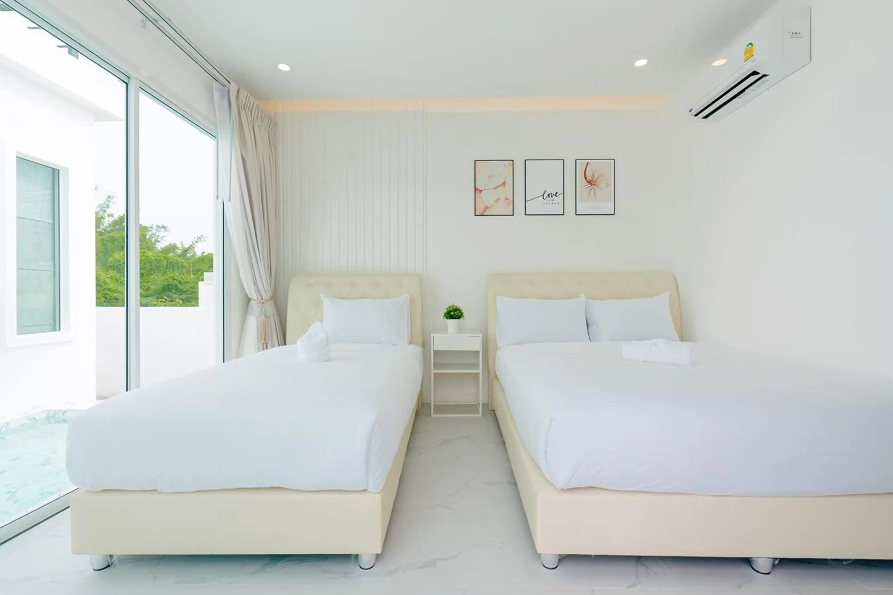 Bed in The Modern Pool Villa Hua Hin