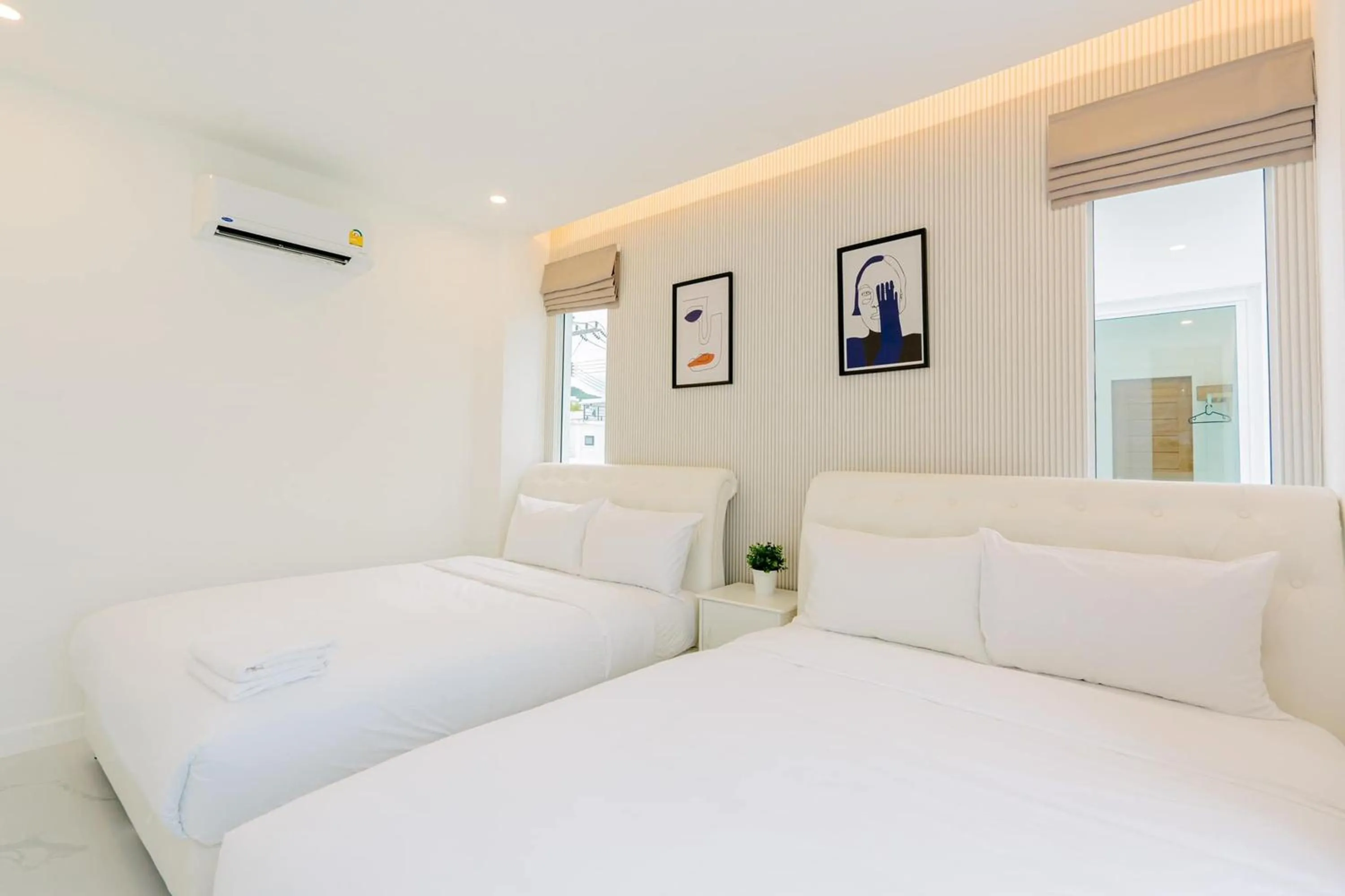 Bed in The Modern Pool Villa Hua Hin