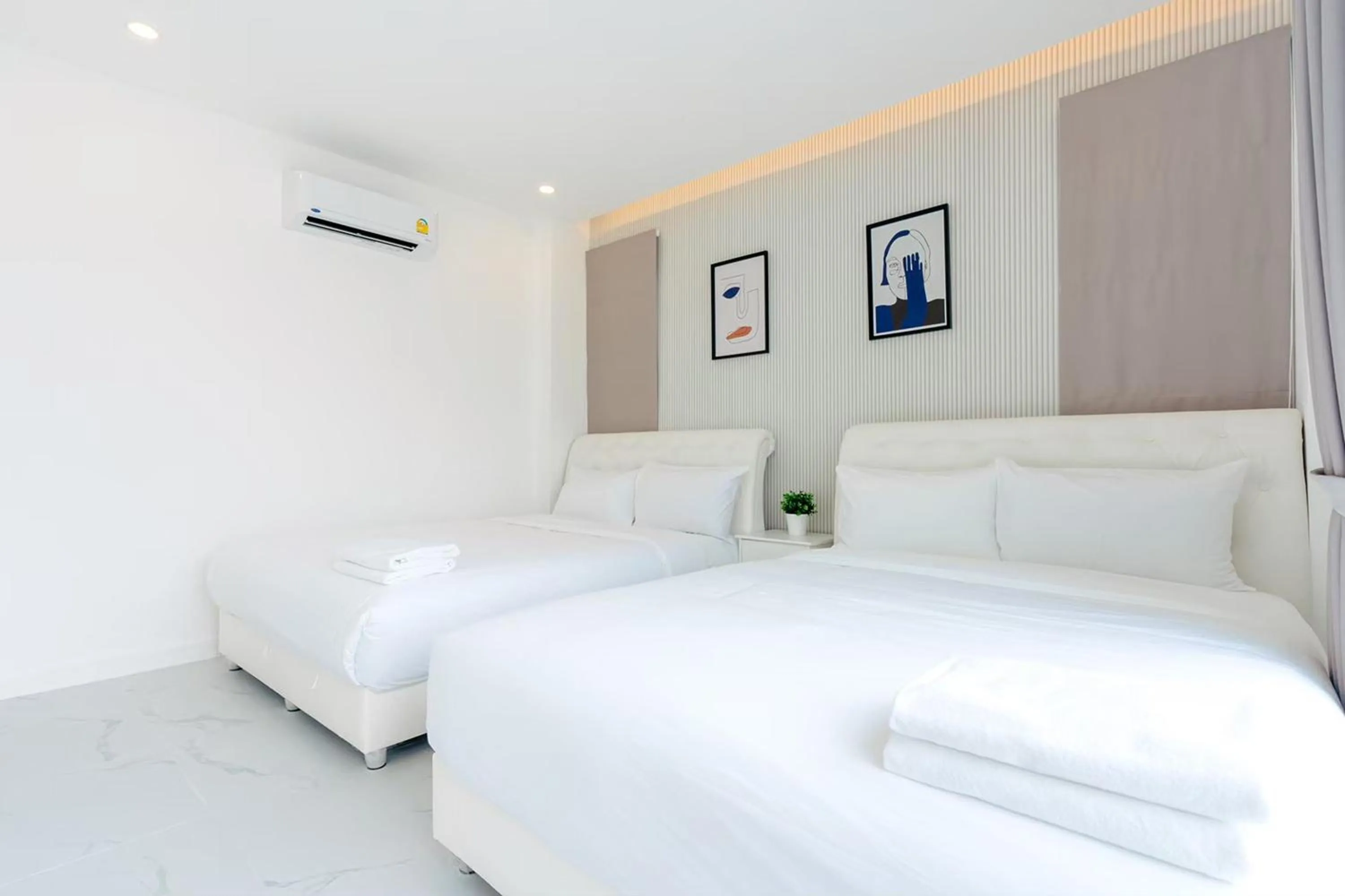 Bed in The Modern Pool Villa Hua Hin