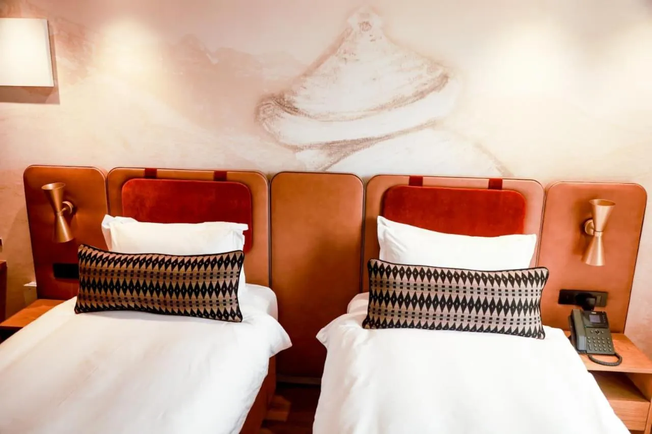 Bed in Mpilo Boutique Hotel