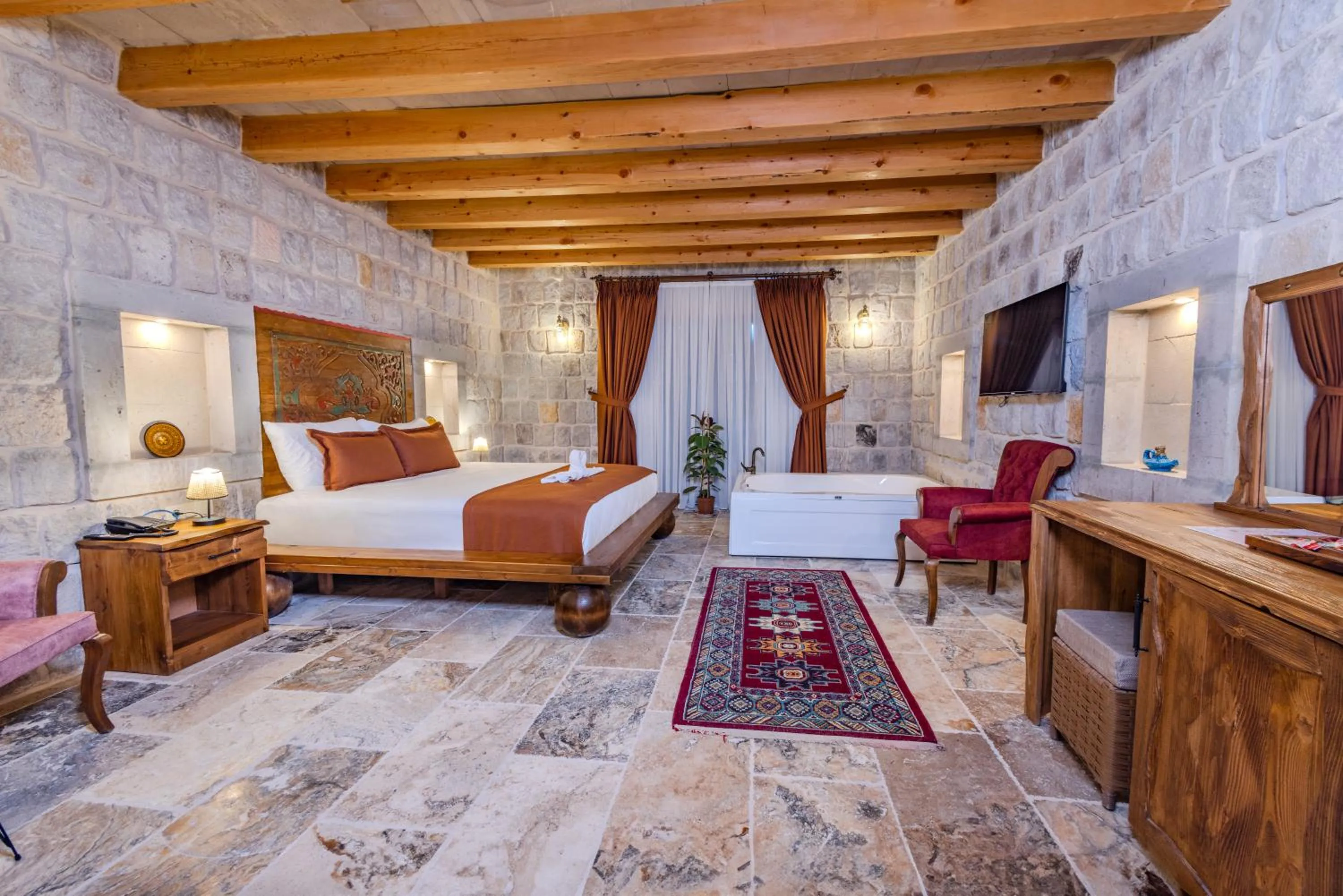 Communal lounge/ TV room, Bed in Gala Cave Cappadocia