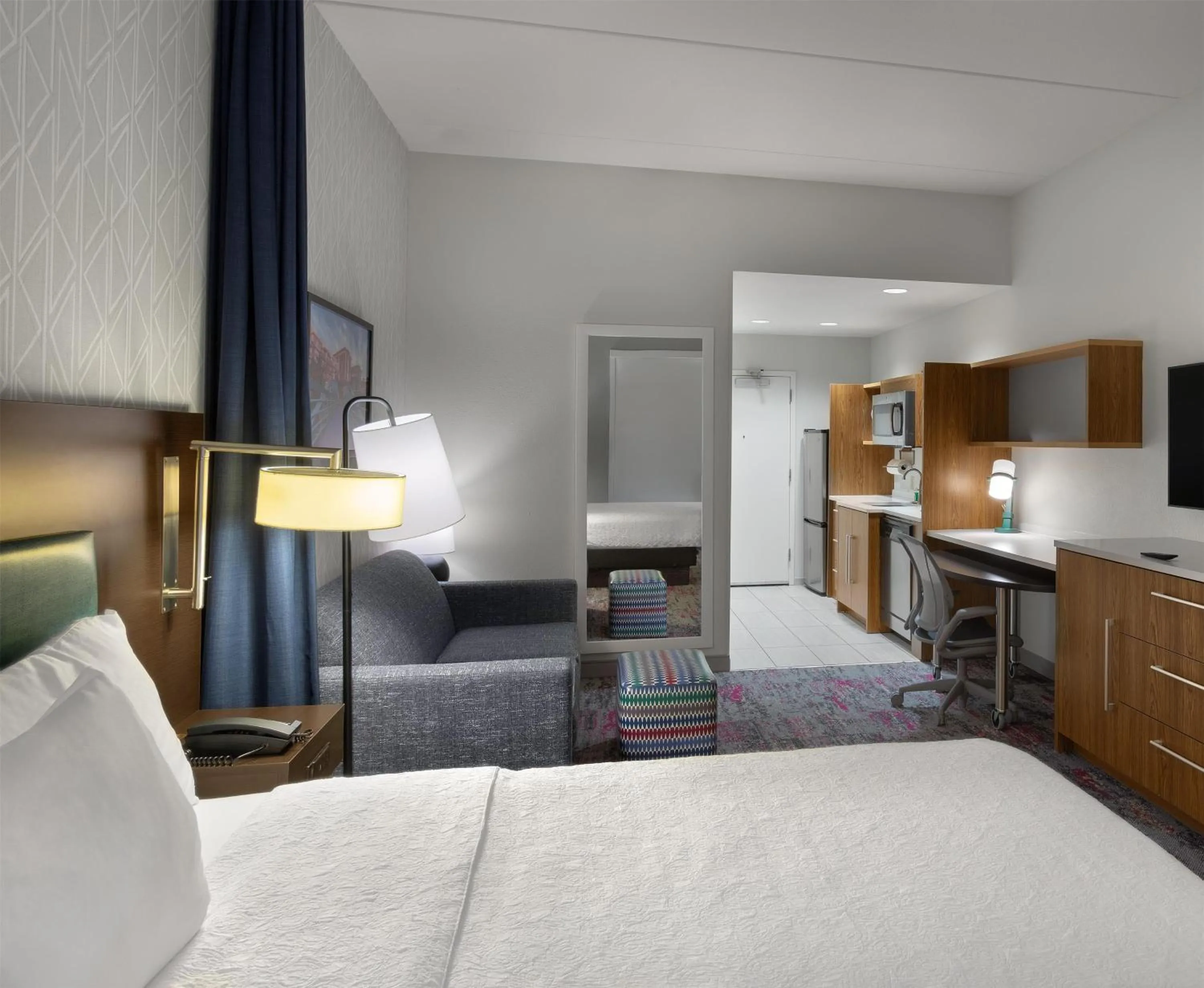 Living room, Bed in Home2 Suites by Hilton Greenville Airport