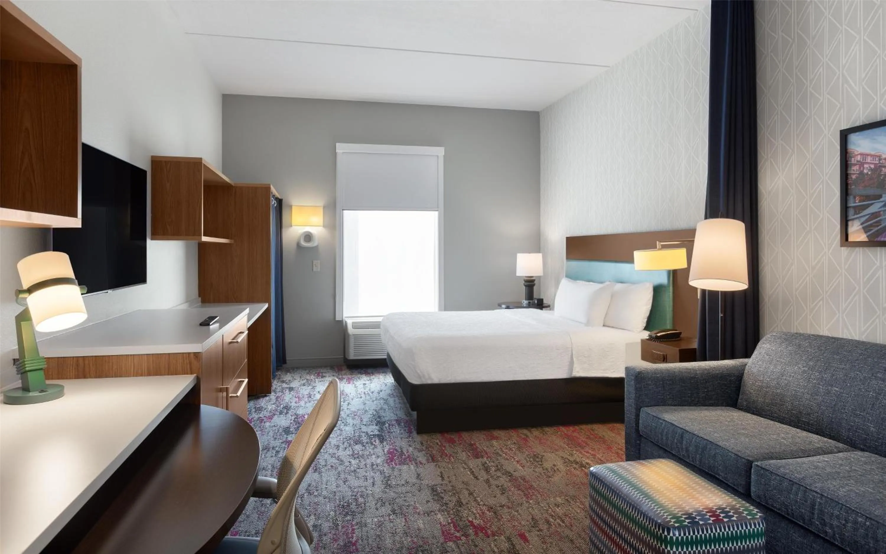 Living room, Bed in Home2 Suites by Hilton Greenville Airport