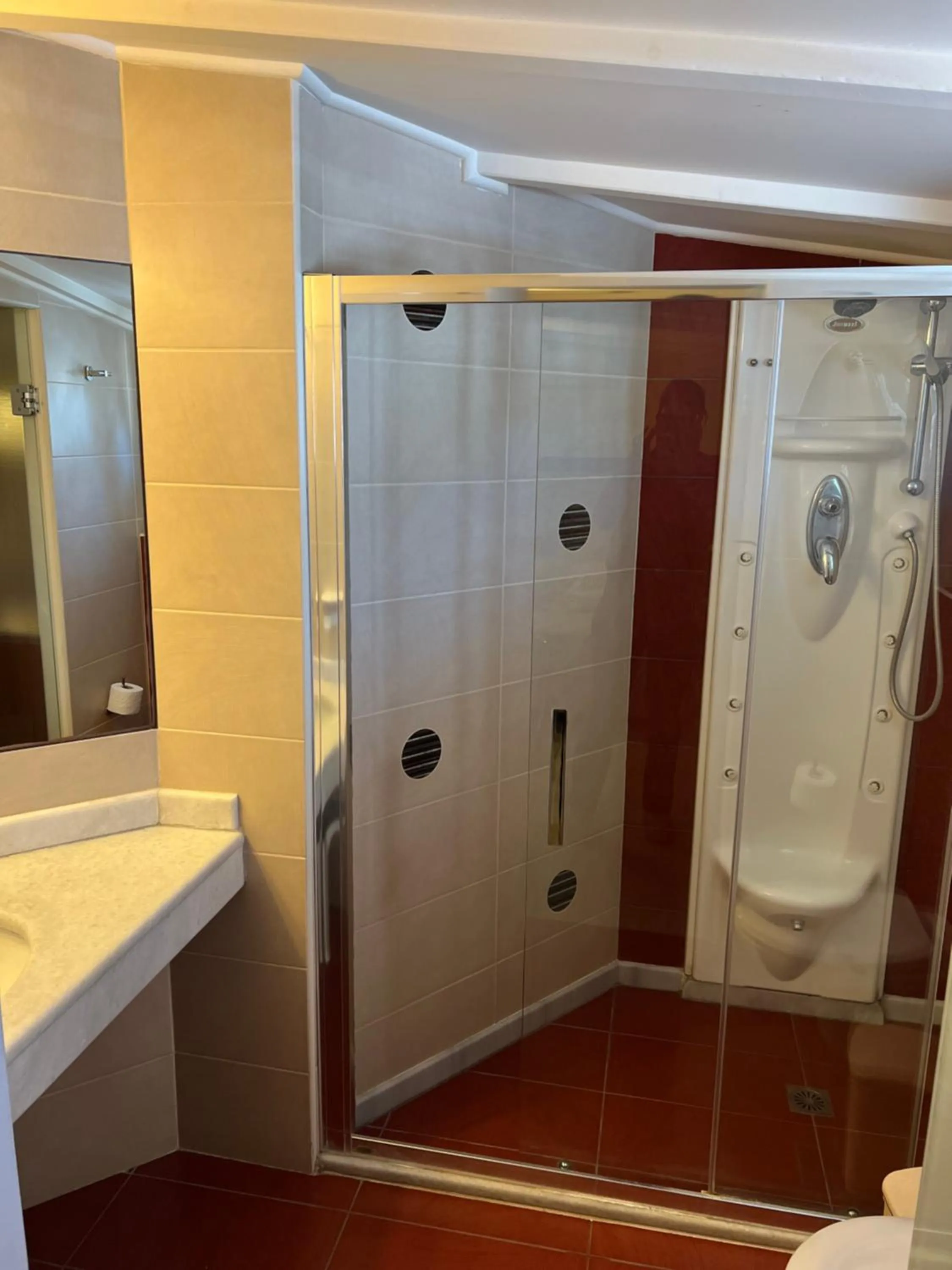 Bathroom in Frini Hotel