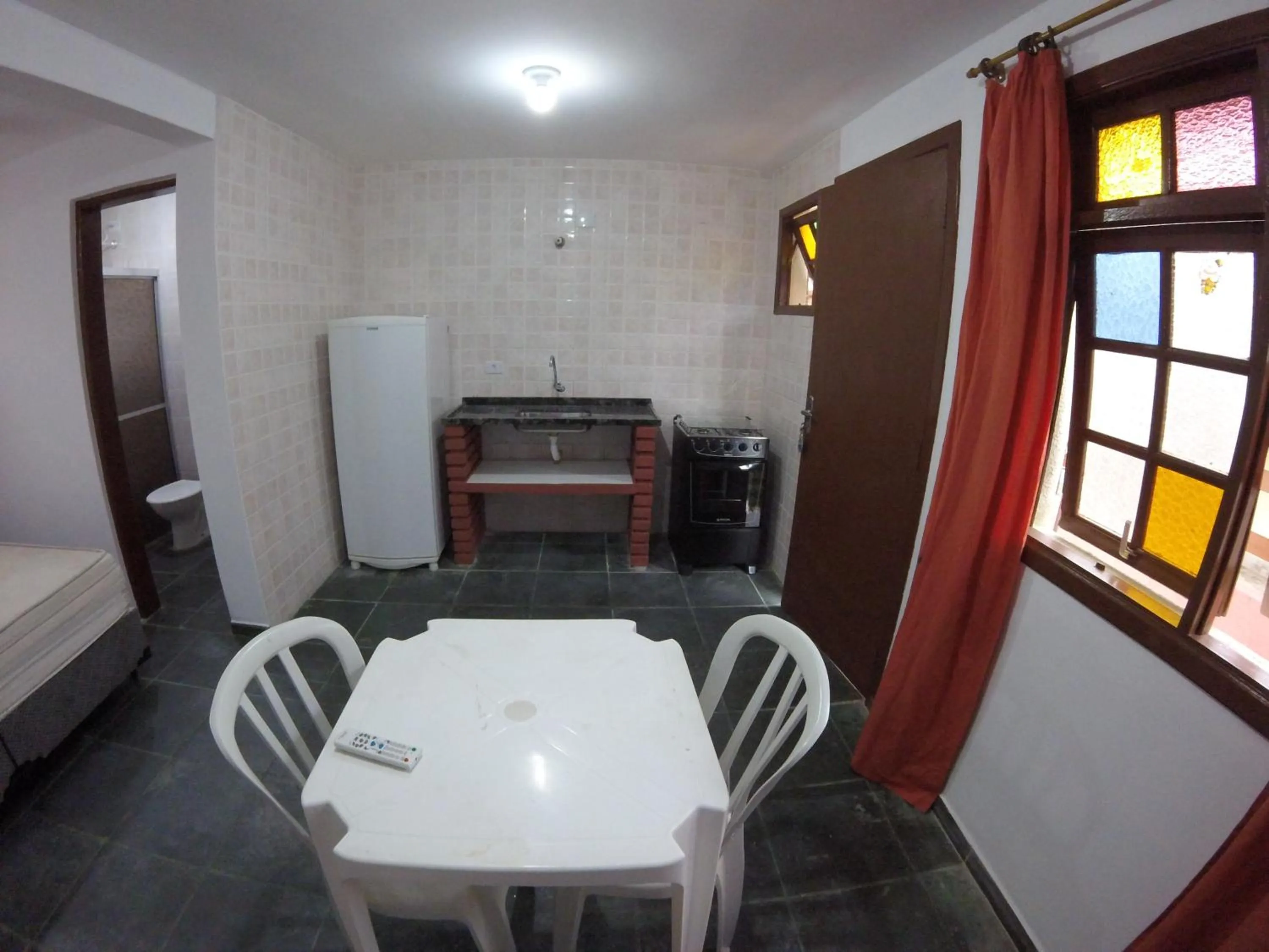 Kitchen or kitchenette in Residencial Chalés Âncora