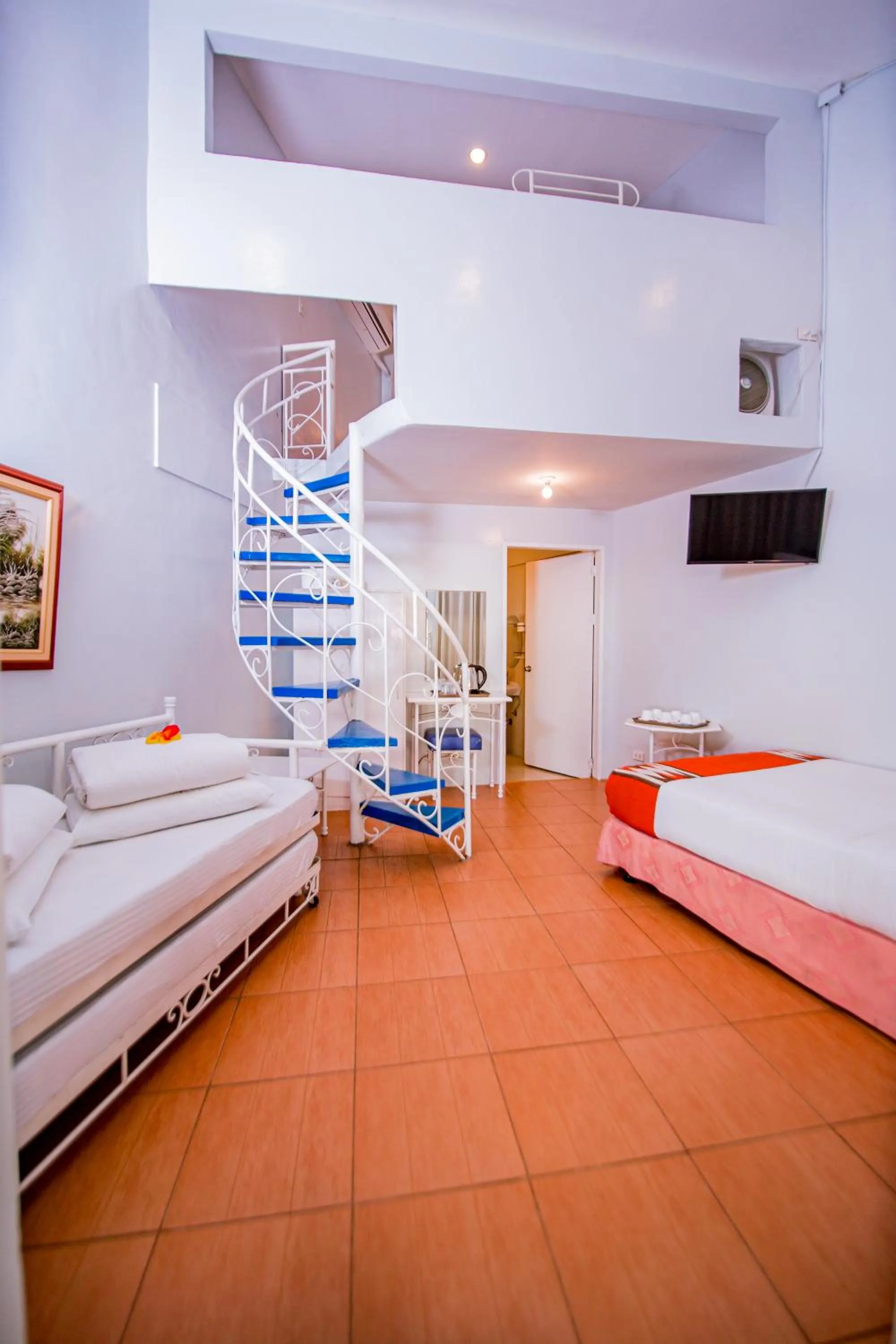 Photo of the whole room, Bed in Paras Beach Resort - Camiguin