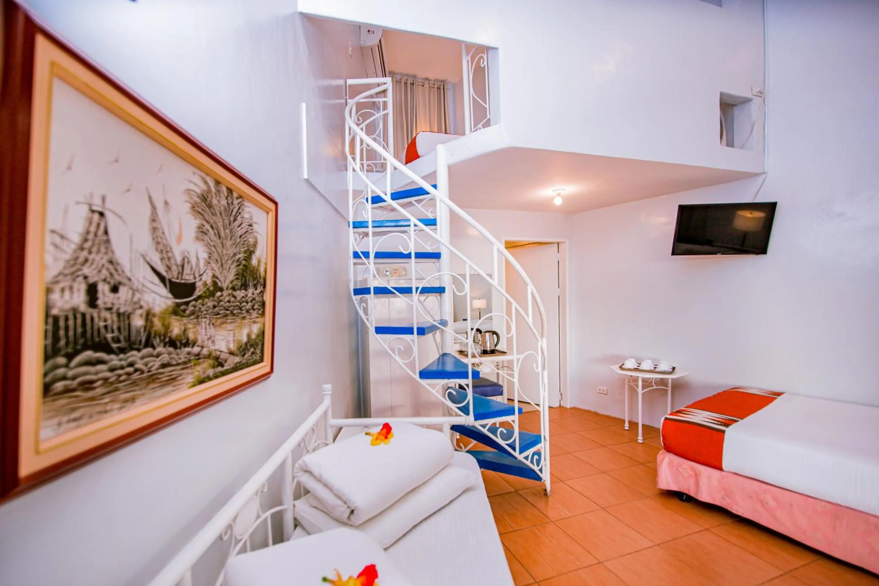 Photo of the whole room, Bed in Paras Beach Resort - Camiguin