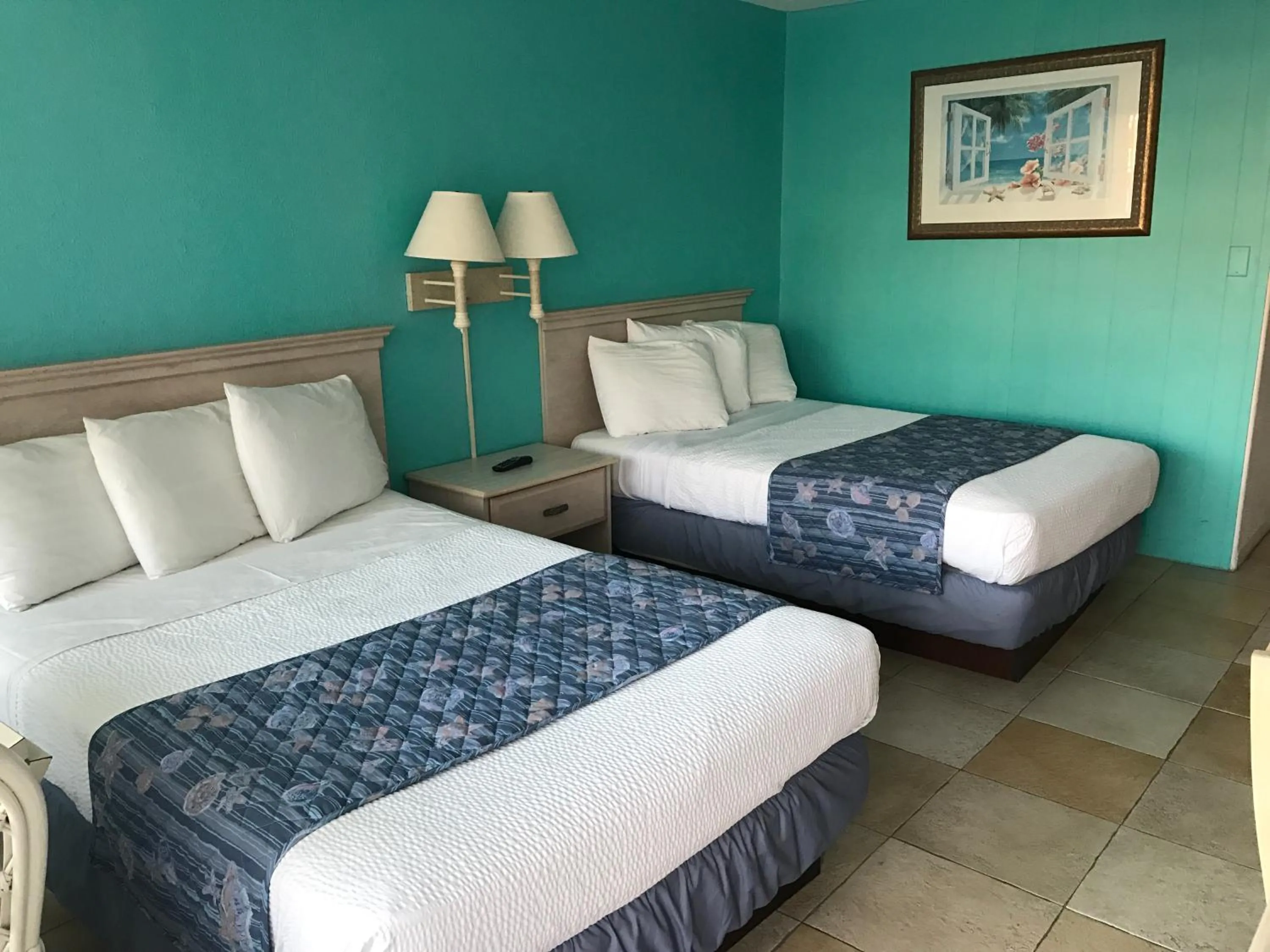 Bed in Tangiers Resort Motel