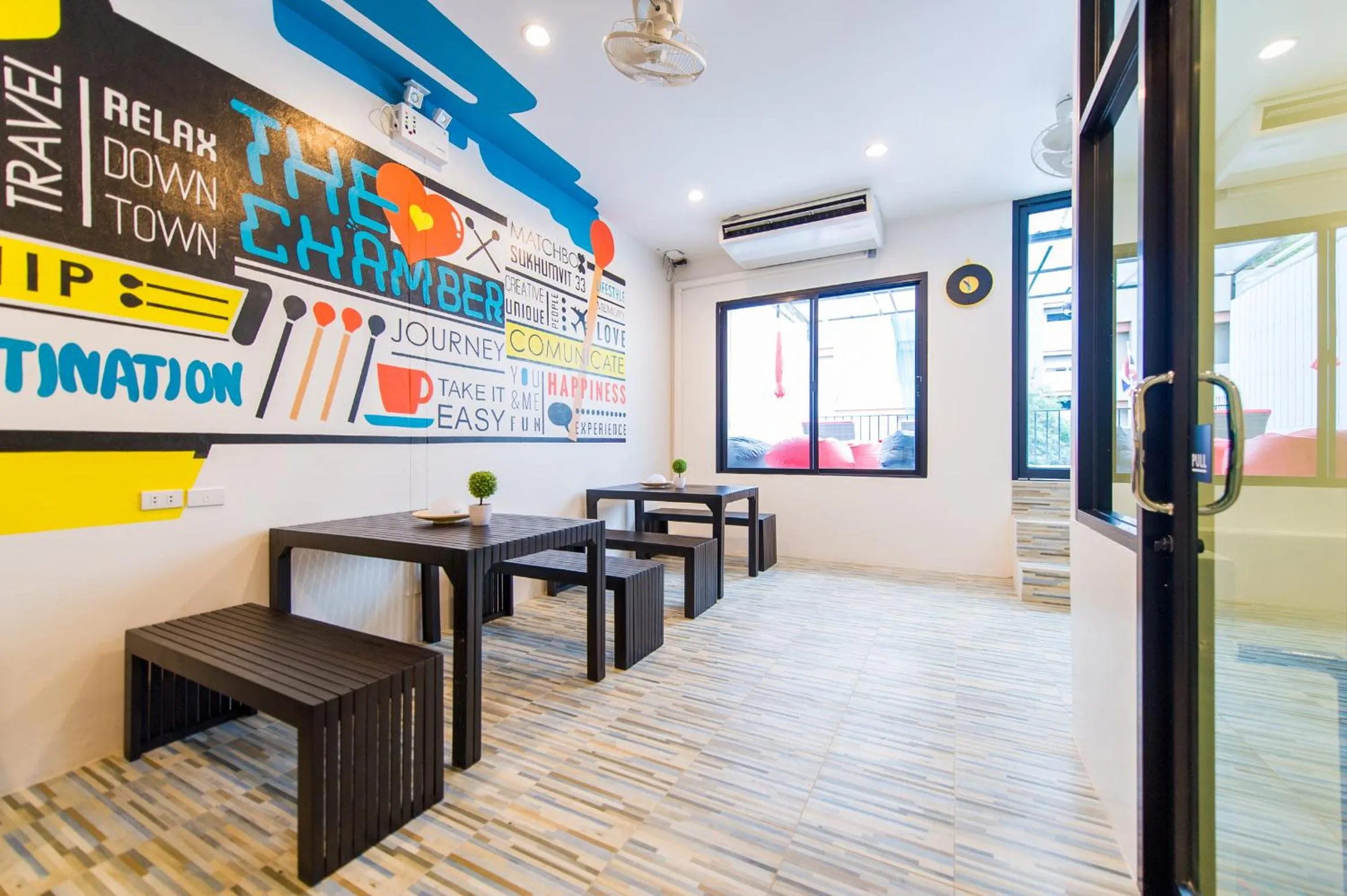 Seating area in Matchbox Bangkok Hostel