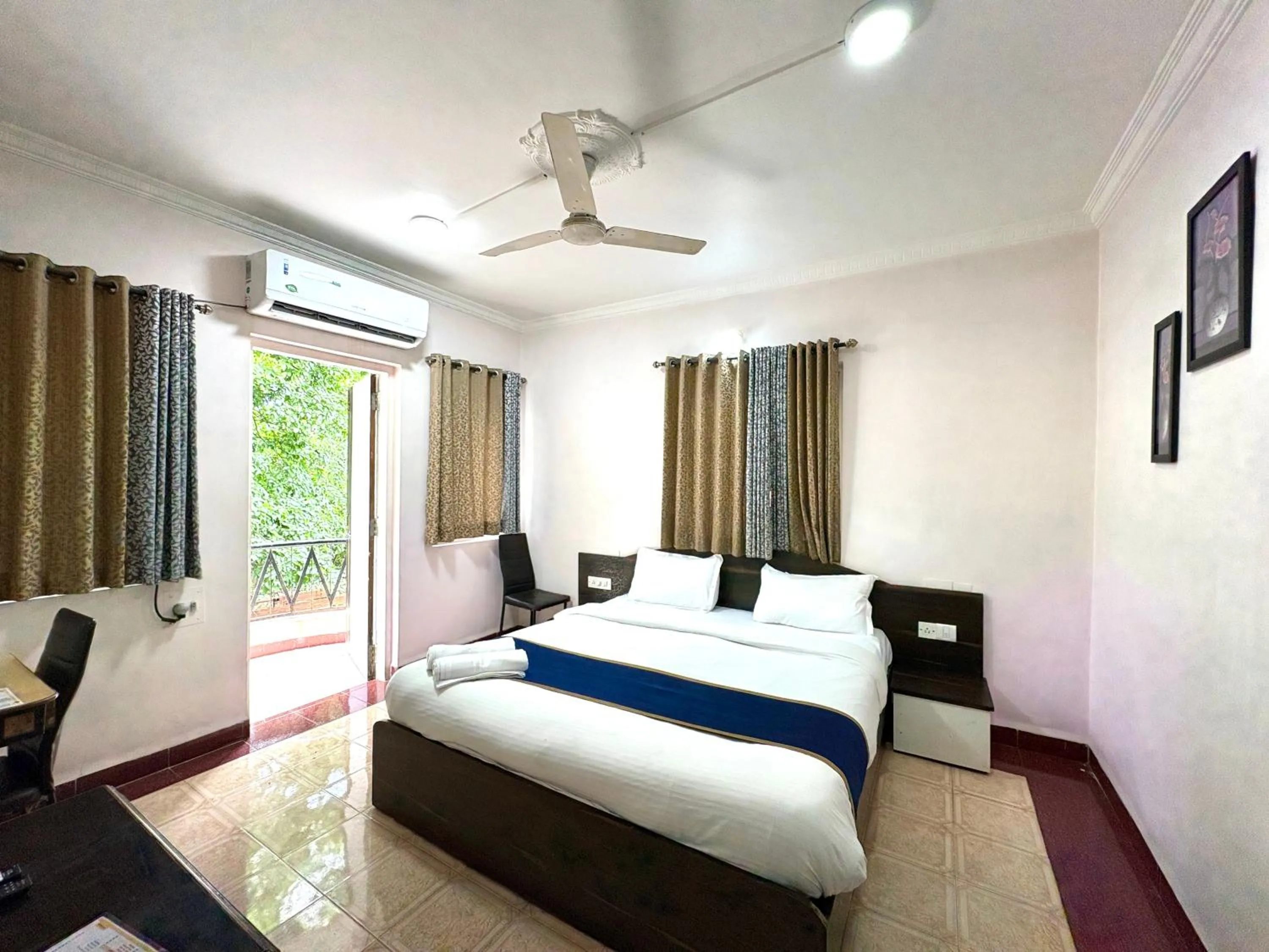 Bed in Hotel Laxmi Residency