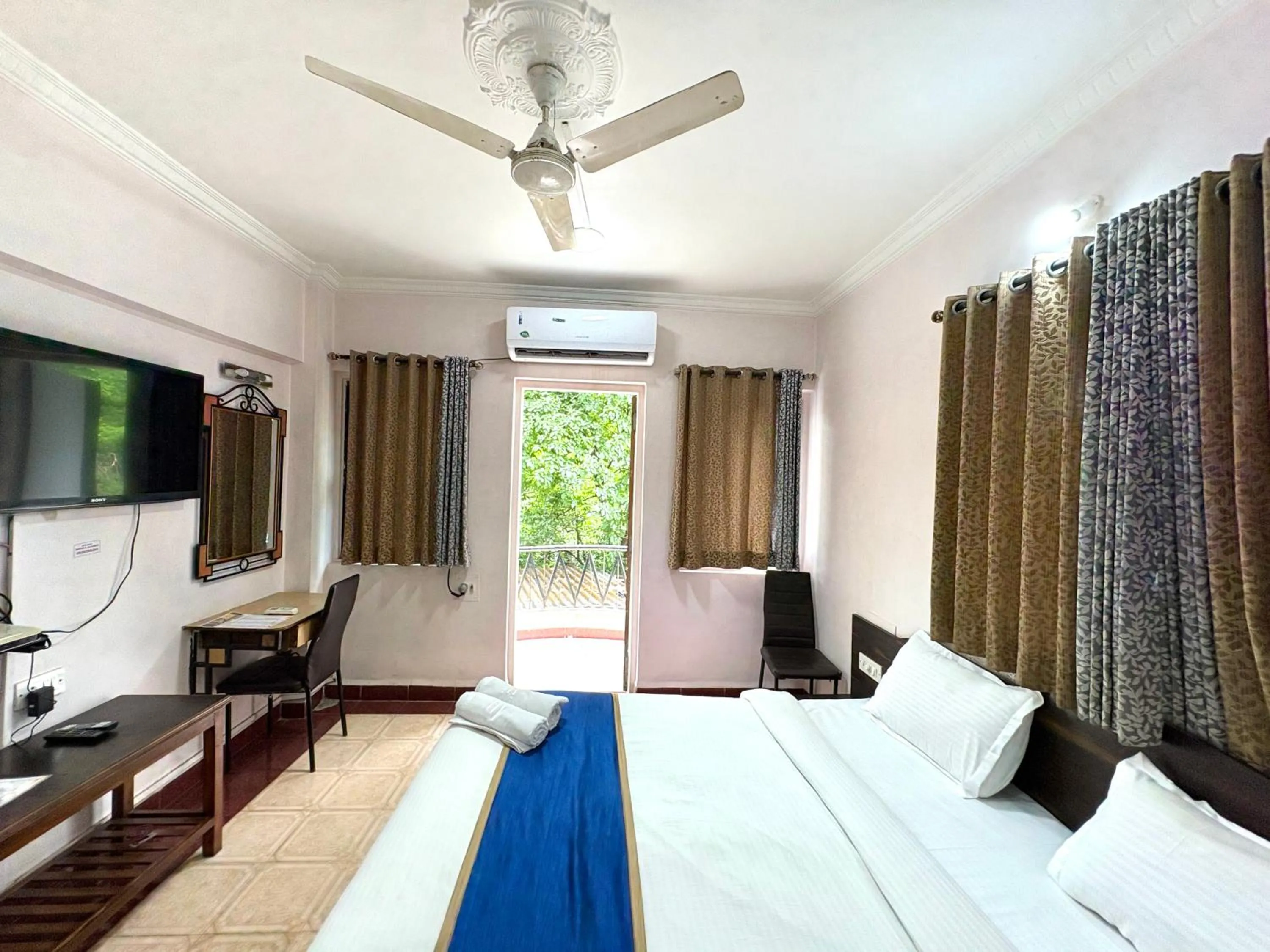Bed in Hotel Laxmi Residency