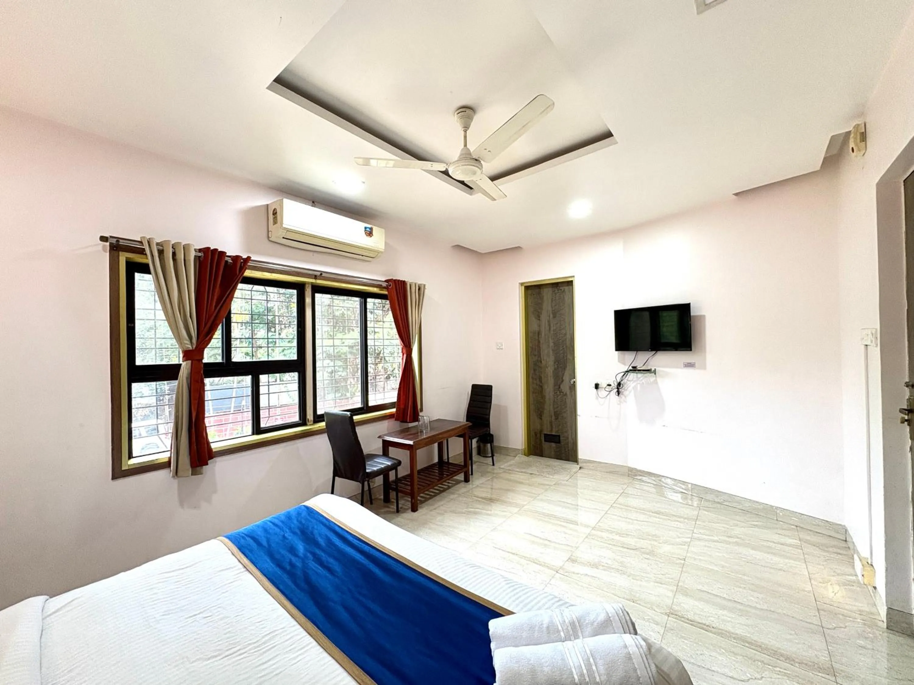 Bed in Hotel Laxmi Residency