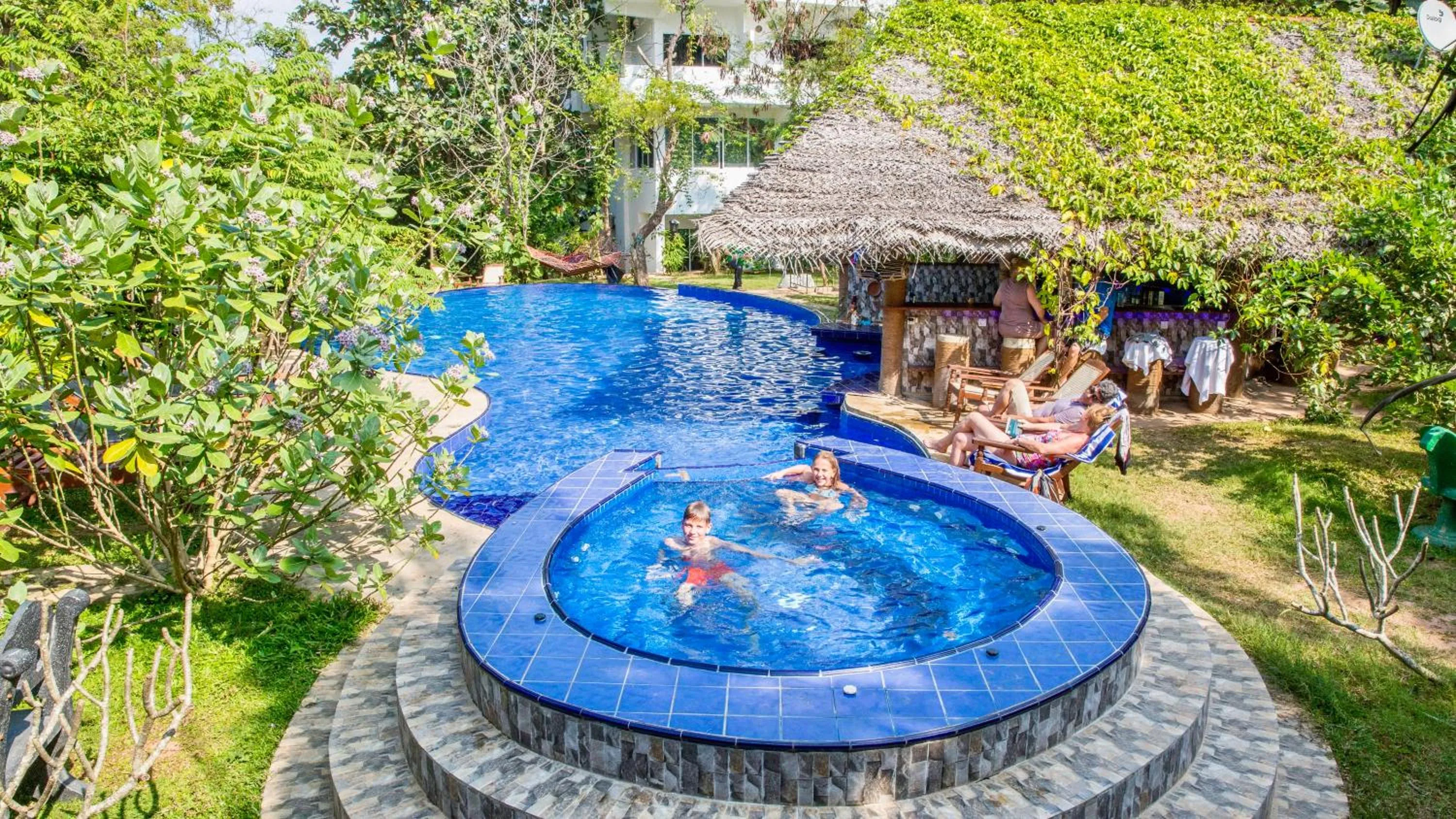 Swimming pool in Sundaras Family Suites