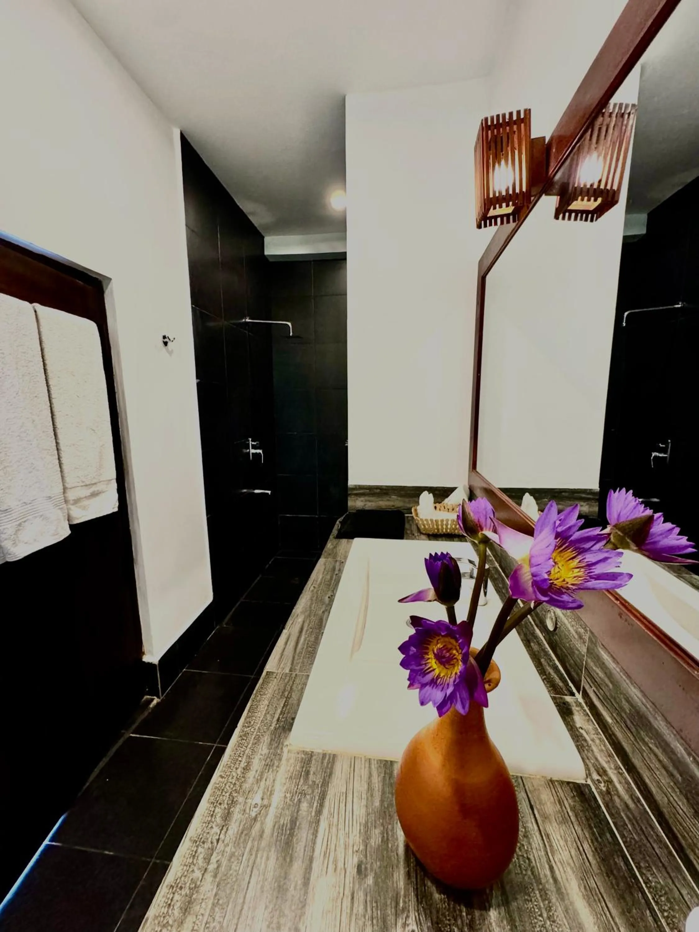 Bathroom in Sundaras Family Suites