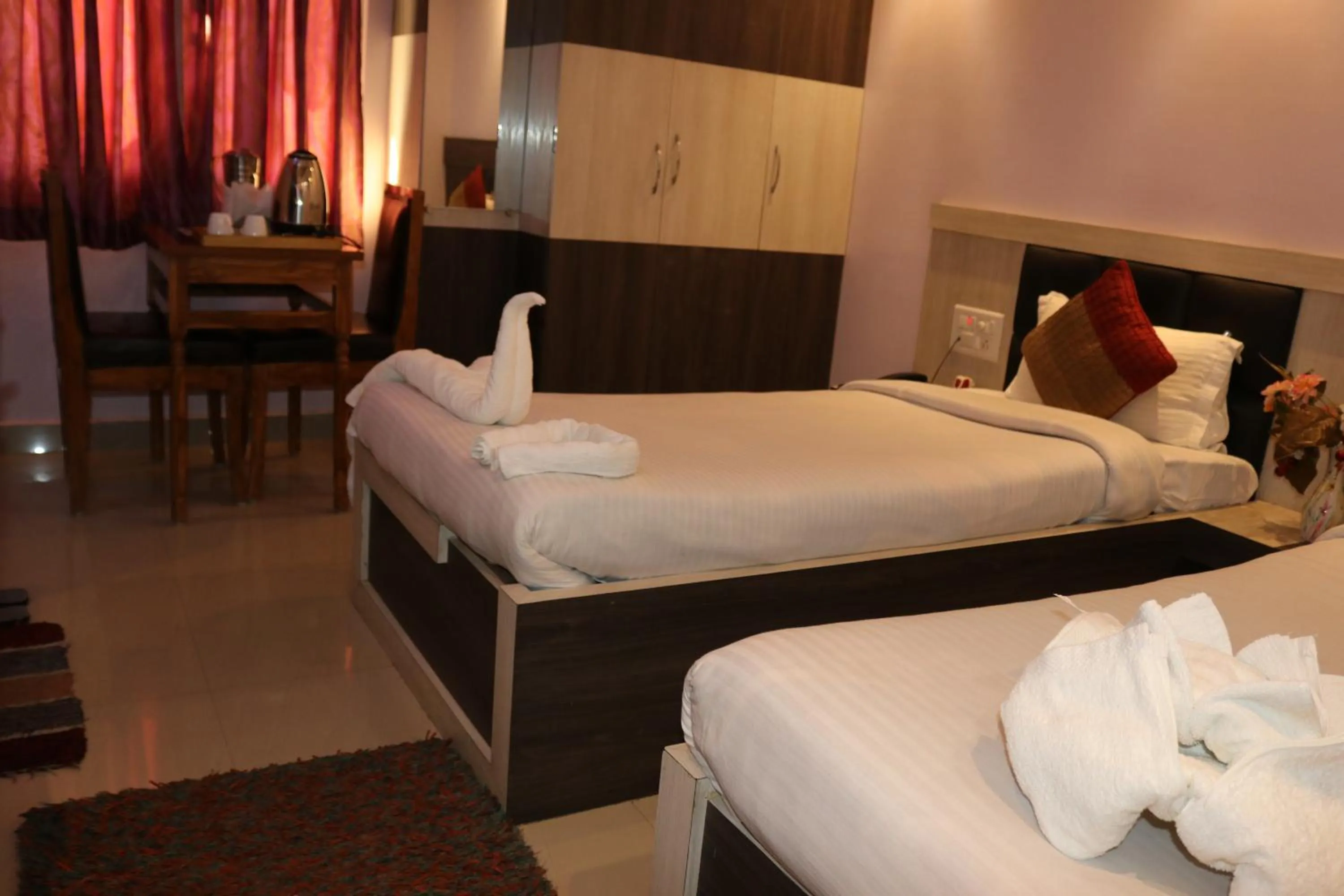 Bed in Hotel Vaishnavi Heights