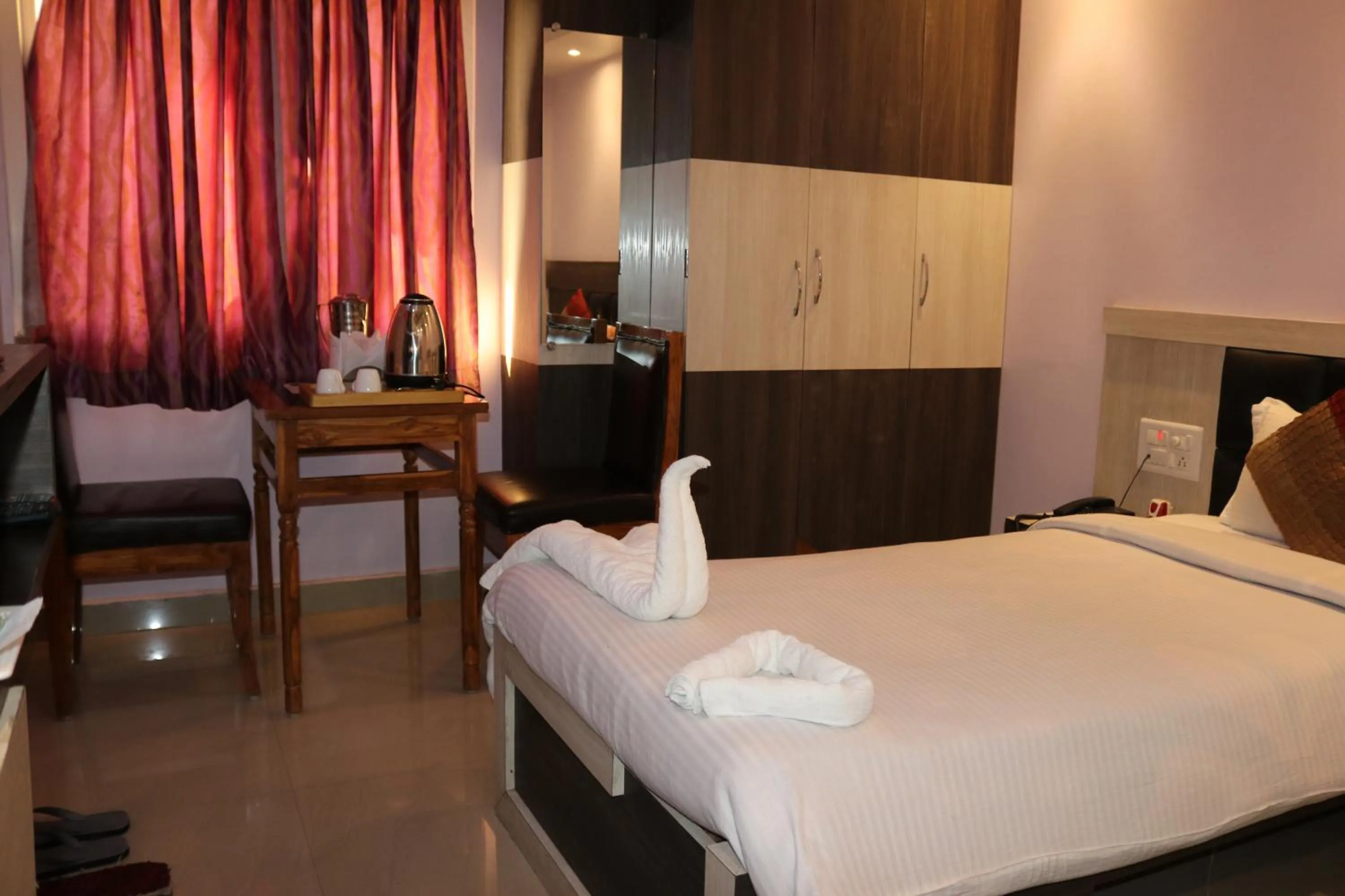 Bed in Hotel Vaishnavi Heights